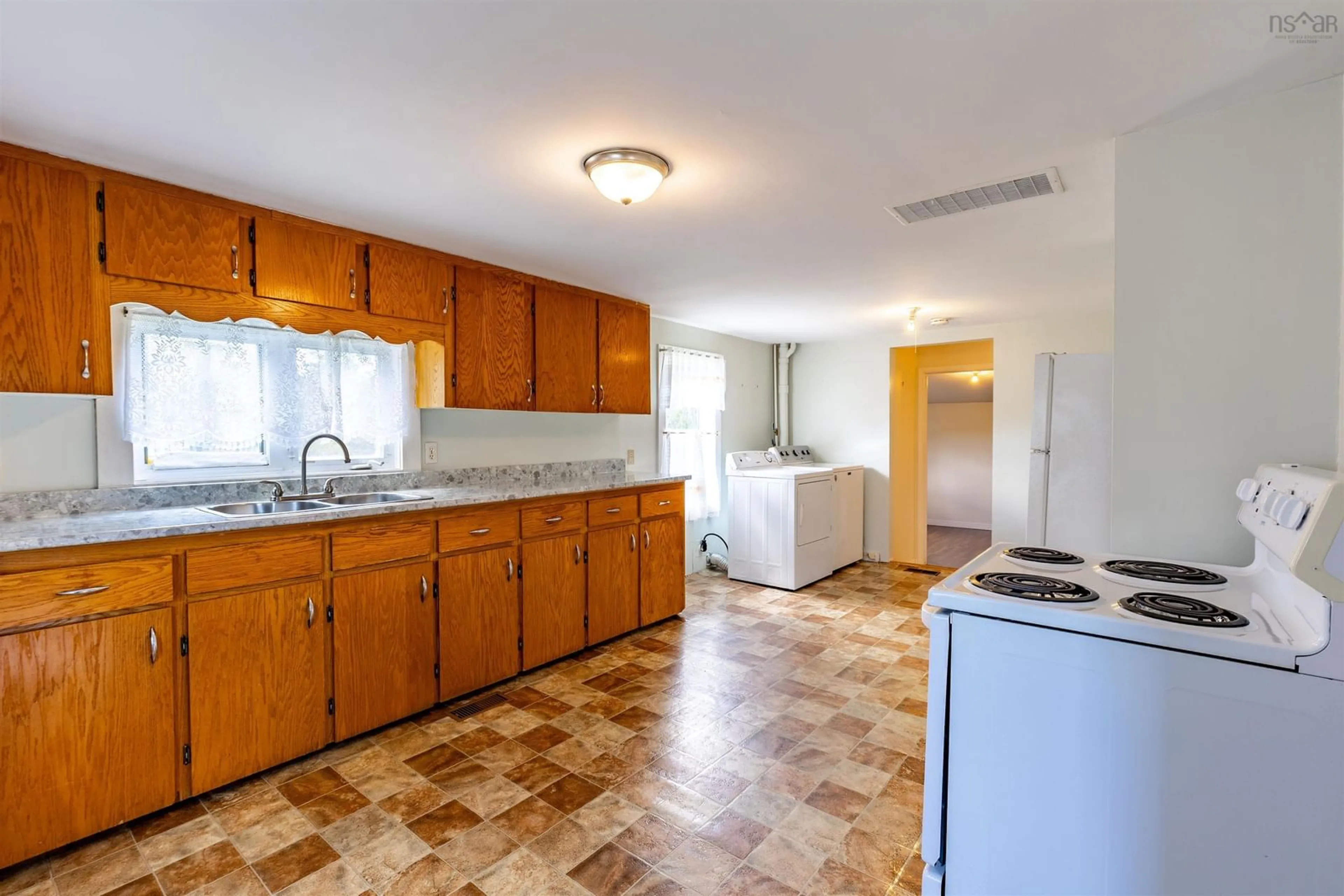 Standard kitchen, ceramic/tile floor for 147 Chemin Des Cottreau Rd, Wedgeport Nova Scotia B0W 3P0