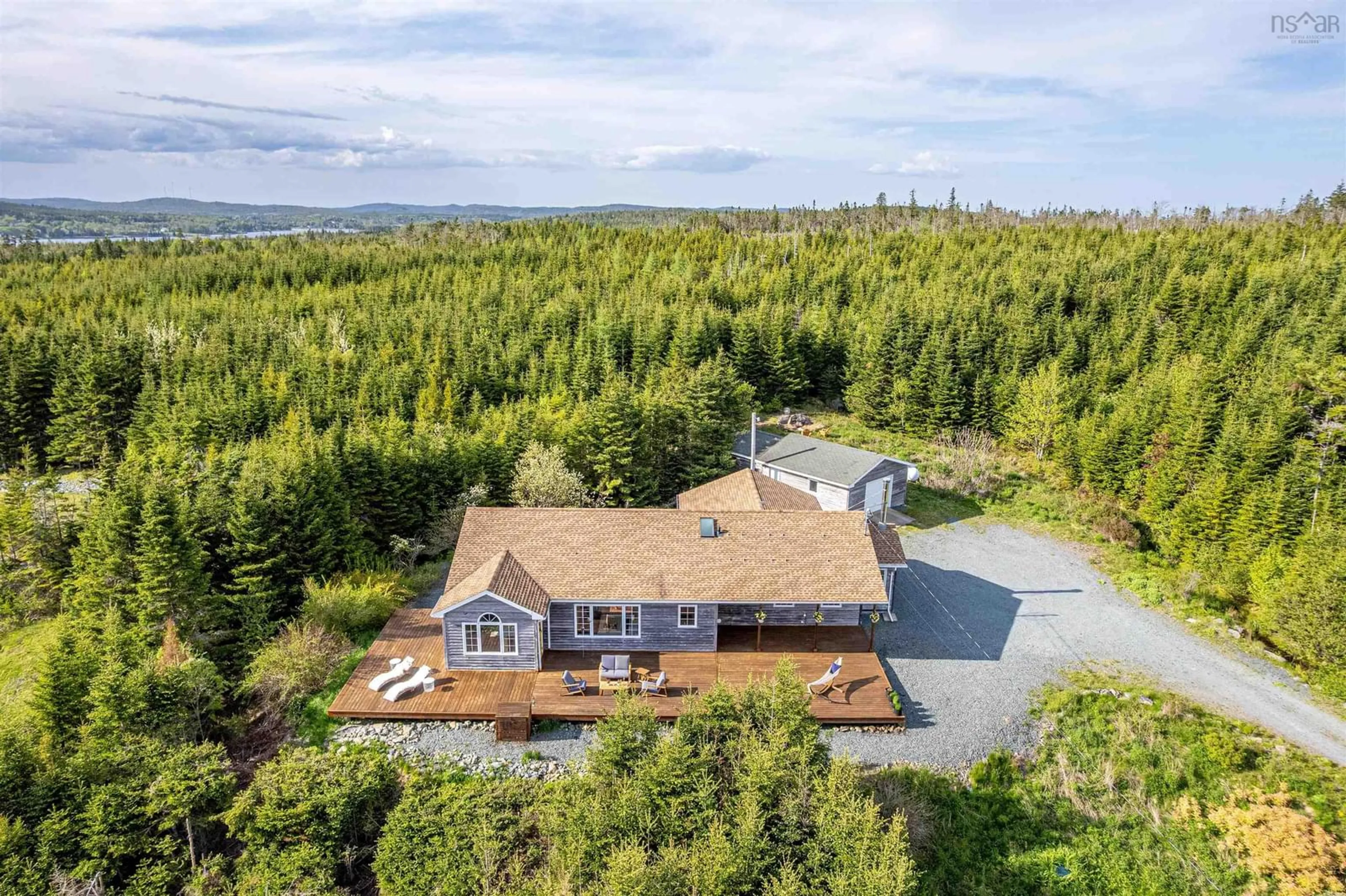A pic from outside/outdoor area/front of a property/back of a property/a pic from drone, water/lake/river/ocean view for 40 Harbour Ridge Dr, East Petpeswick Nova Scotia B0J 2L0
