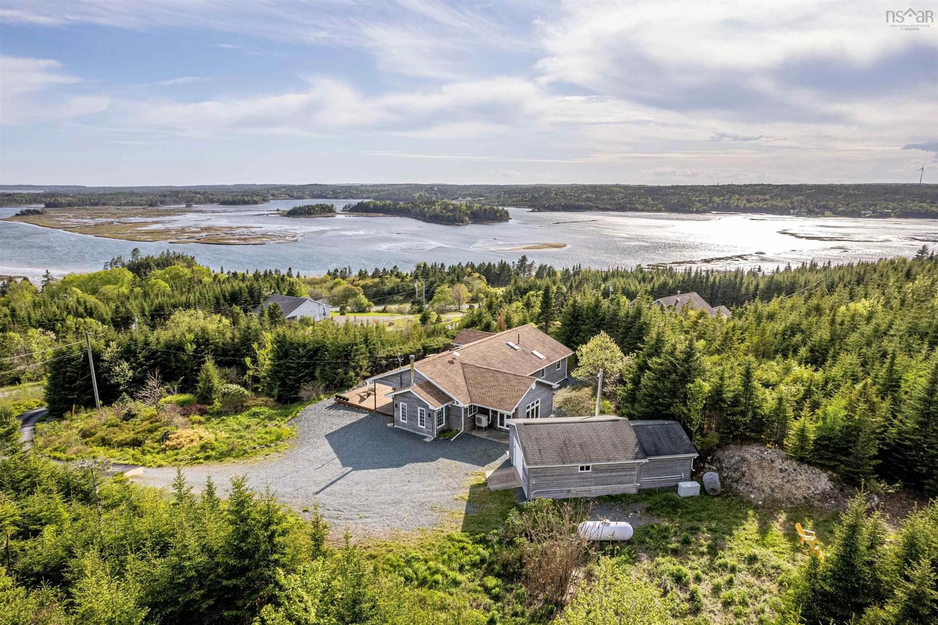 A pic from outside/outdoor area/front of a property/back of a property/a pic from drone, water/lake/river/ocean view for 40 Harbour Ridge Dr, East Petpeswick Nova Scotia B0J 2L0