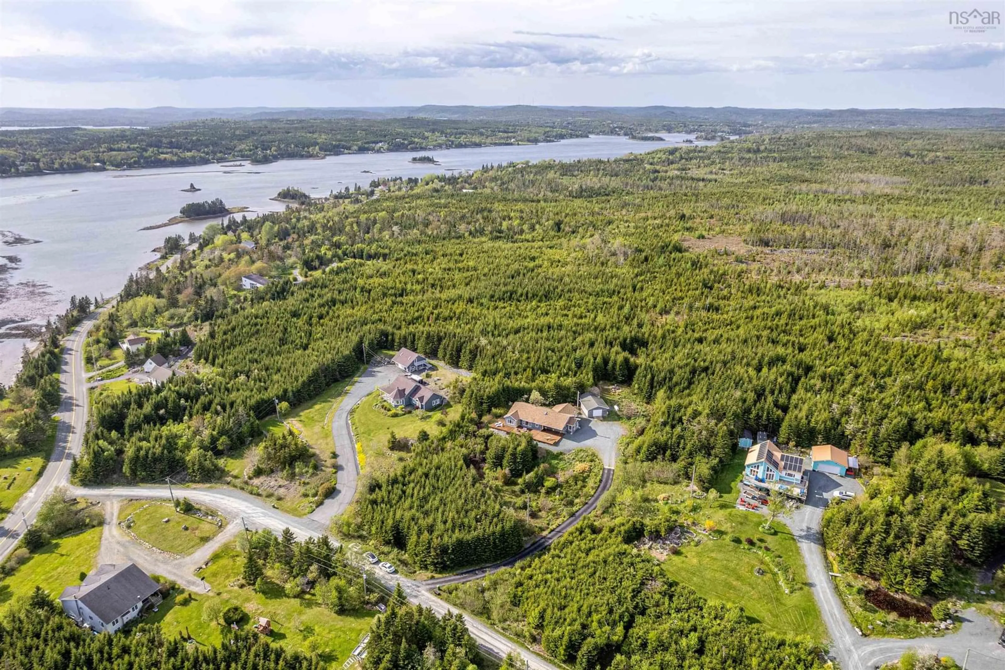 A pic from outside/outdoor area/front of a property/back of a property/a pic from drone, water/lake/river/ocean view for 40 Harbour Ridge Dr, East Petpeswick Nova Scotia B0J 2L0
