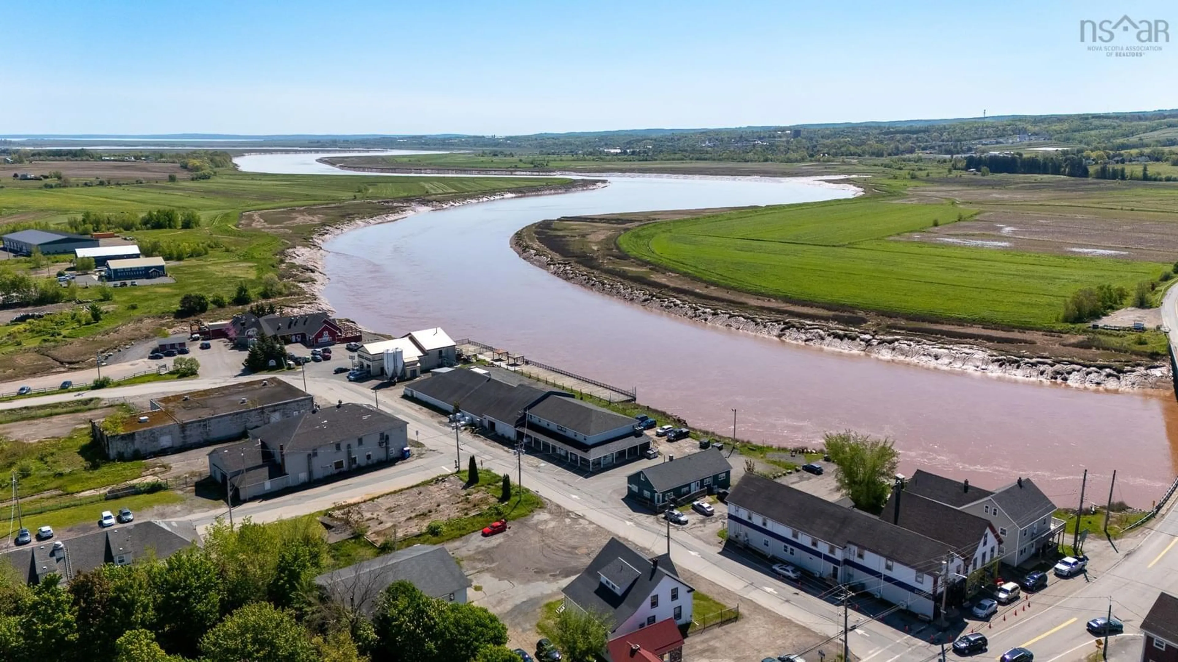 A pic from outside/outdoor area/front of a property/back of a property/a pic from drone, water/lake/river/ocean view for 1093 Kars St, Port Williams Nova Scotia B0P 1T0