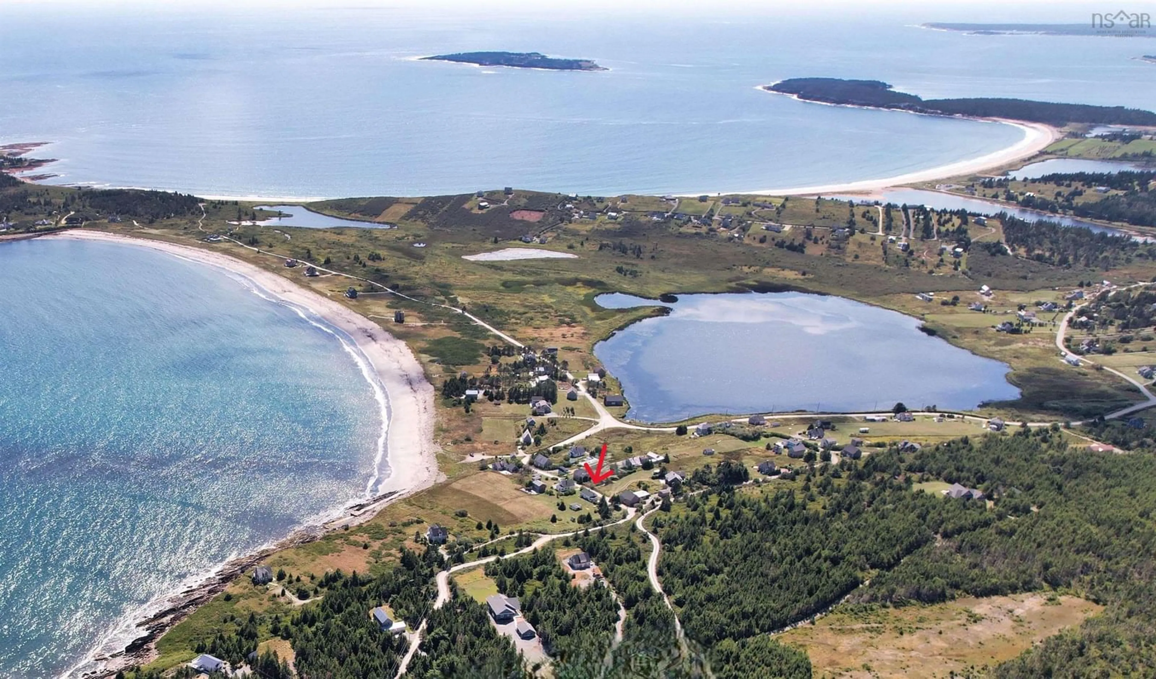 A pic from outside/outdoor area/front of a property/back of a property/a pic from drone, water/lake/river/ocean view for 79 Mosher Rd, Kingsburg Nova Scotia B0J 2X0