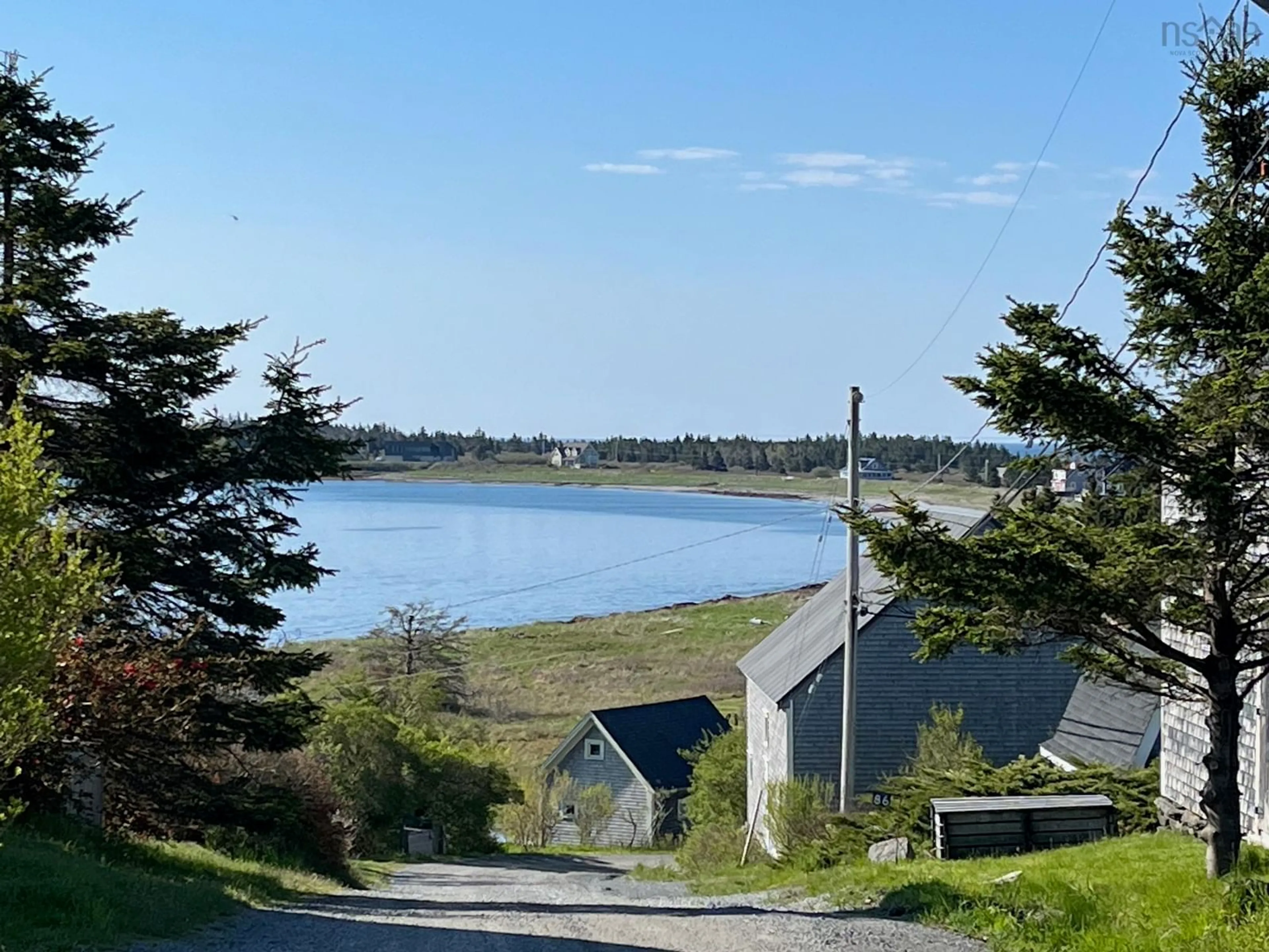 A pic from outside/outdoor area/front of a property/back of a property/a pic from drone, water/lake/river/ocean view for 79 Mosher Rd, Kingsburg Nova Scotia B0J 2X0