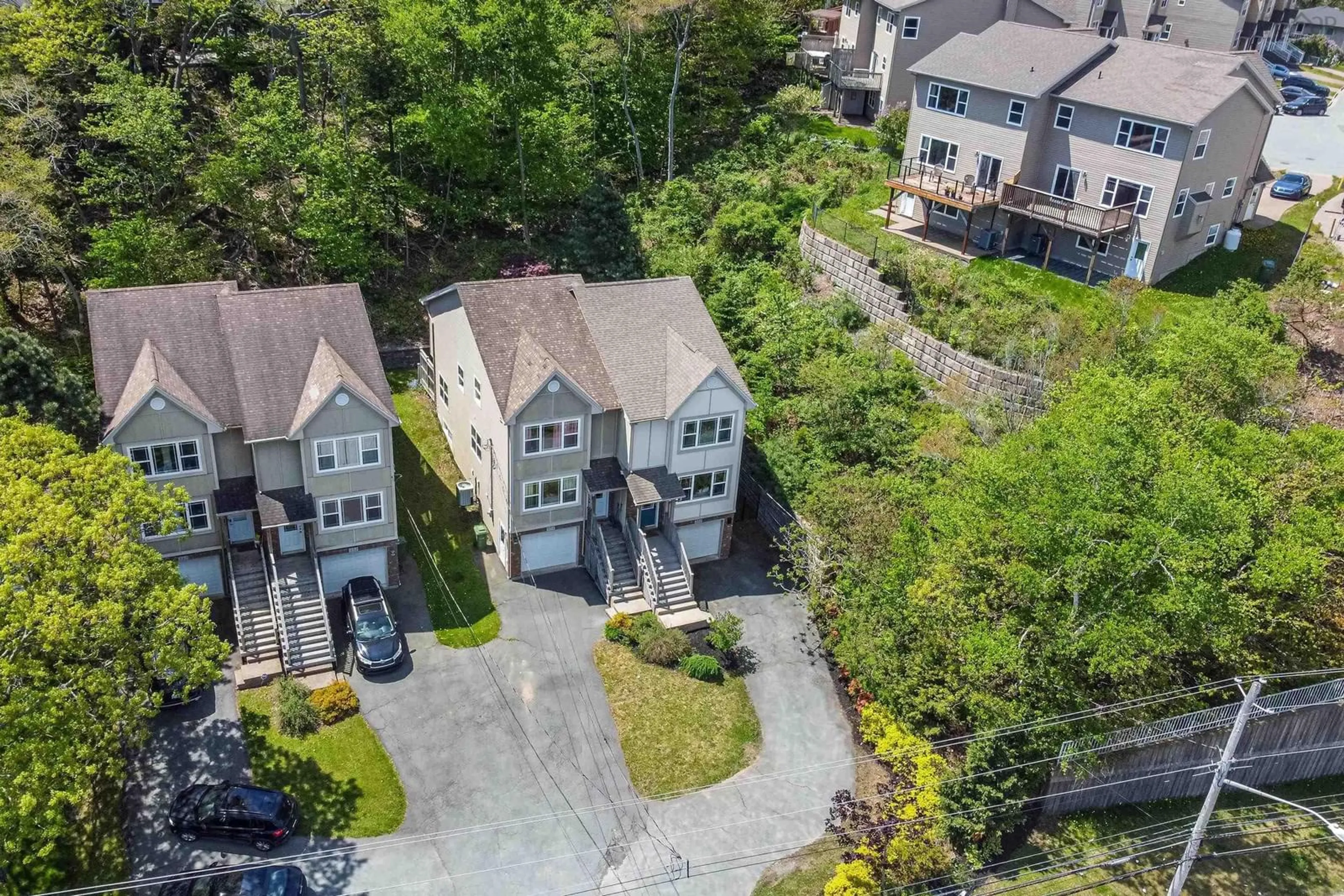 A pic from outside/outdoor area/front of a property/back of a property/a pic from drone, street for 356 Bedford Highway, Halifax Nova Scotia B3M 2K9