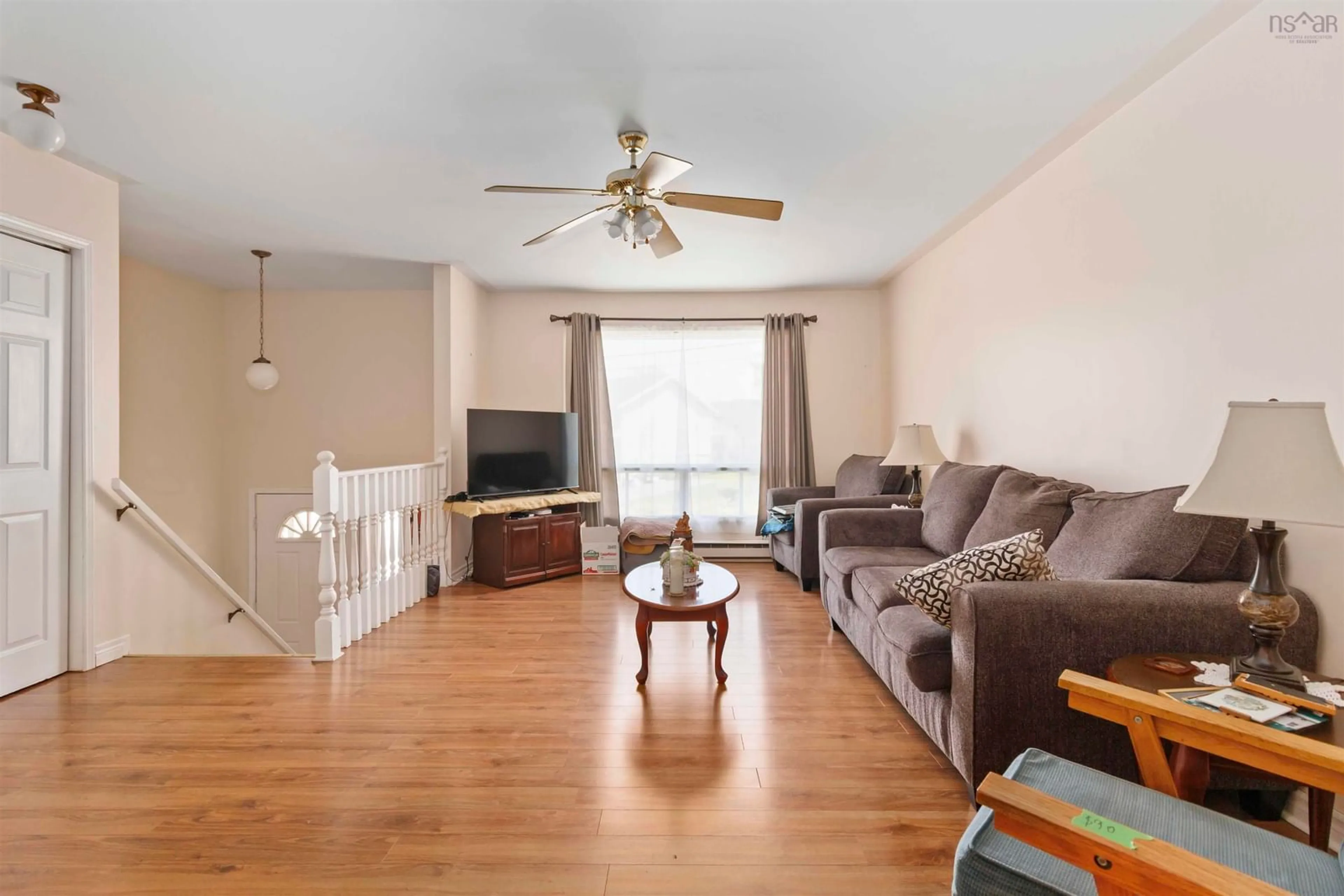Living room with furniture, wood/laminate floor for 15 Contessa, Lower Sackville Nova Scotia B4C 3W2