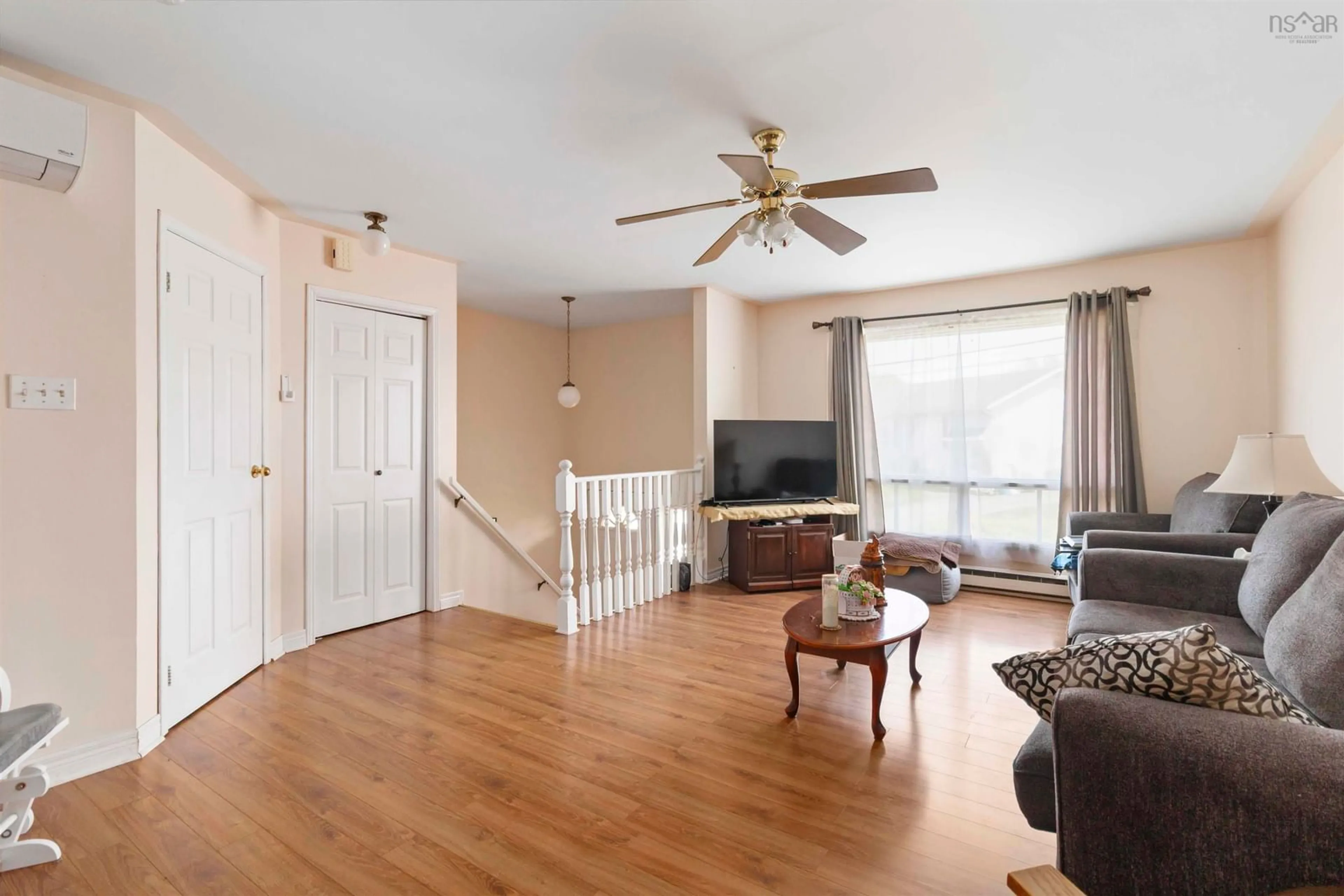 Living room with furniture, wood/laminate floor for 15 Contessa, Lower Sackville Nova Scotia B4C 3W2
