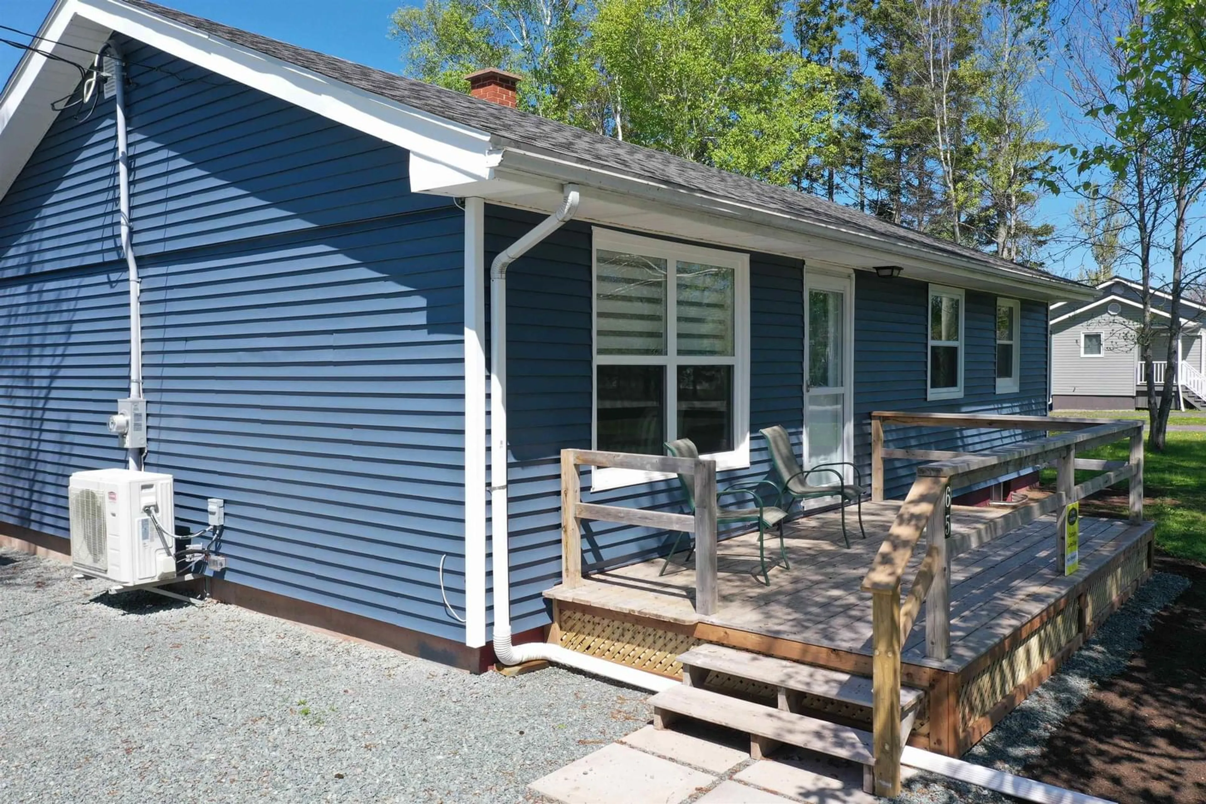 Home with vinyl exterior material, street for 65 Harris Rd, Haliburton Nova Scotia B0K 1H0