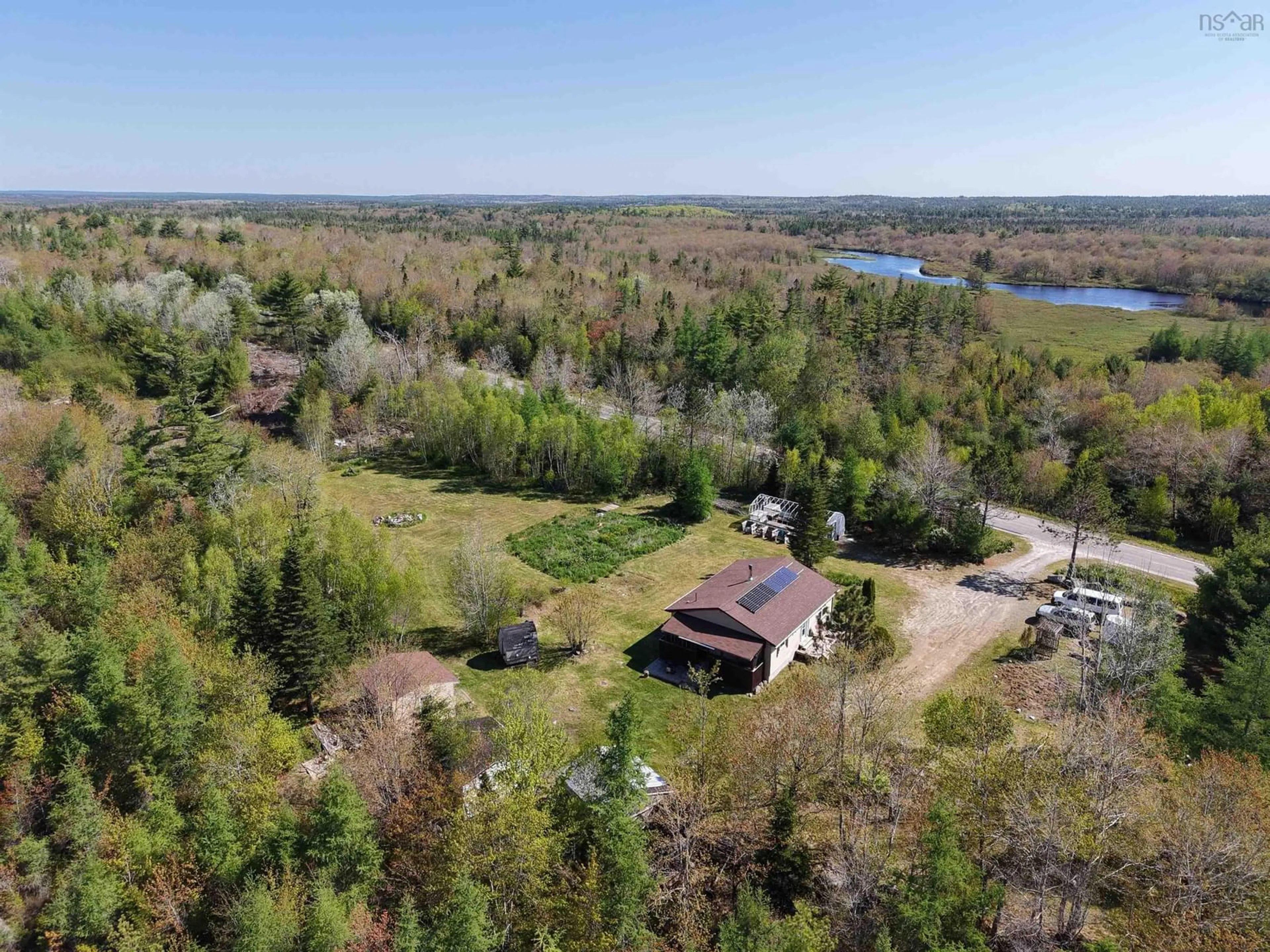 A pic from outside/outdoor area/front of a property/back of a property/a pic from drone, water/lake/river/ocean view for 6135 Highway 203, Indian Fields Nova Scotia B0T 1W0