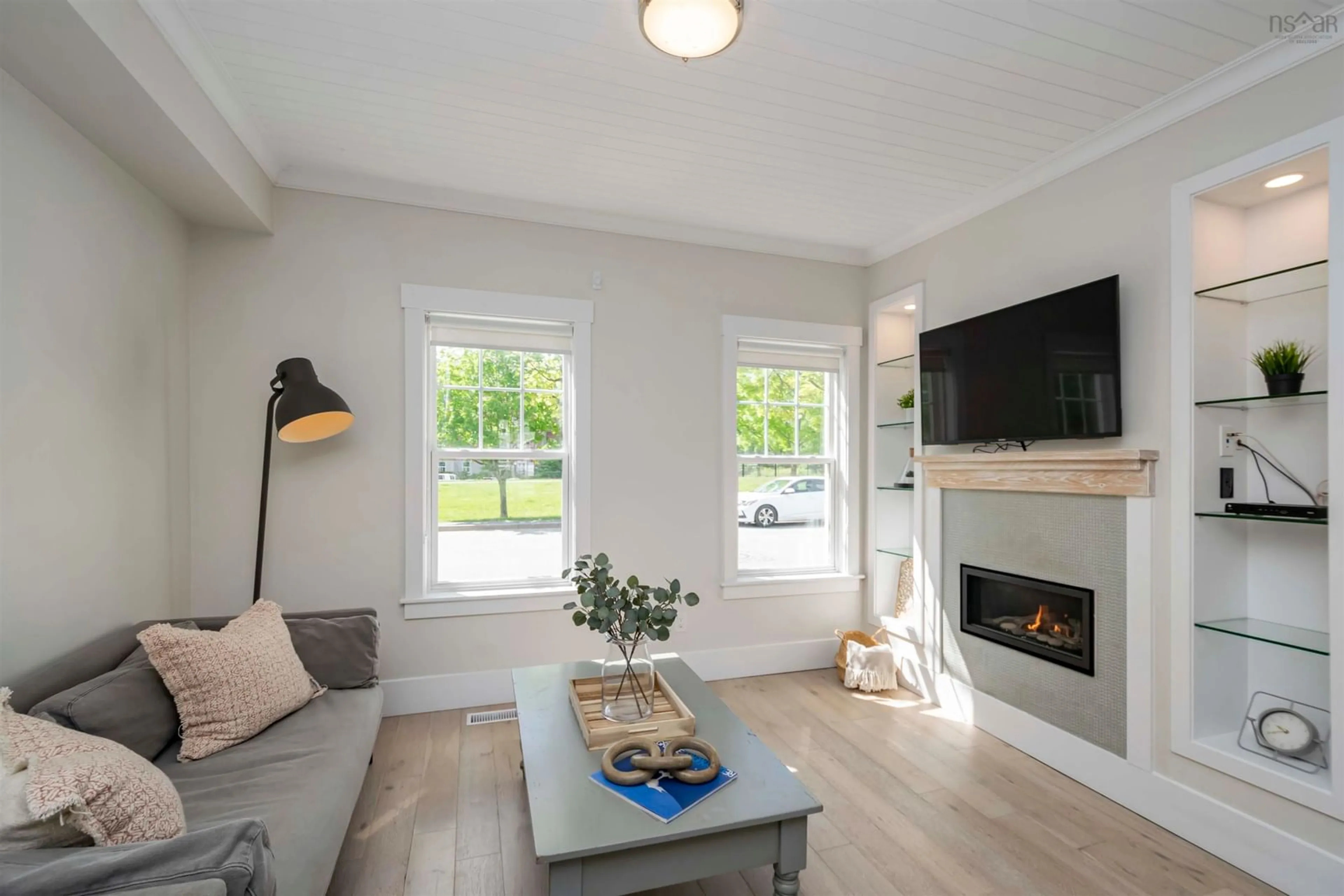 Living room with furniture, wood/laminate floor for 37 Prince Albert Rd, Dartmouth Nova Scotia B2Y 1L8