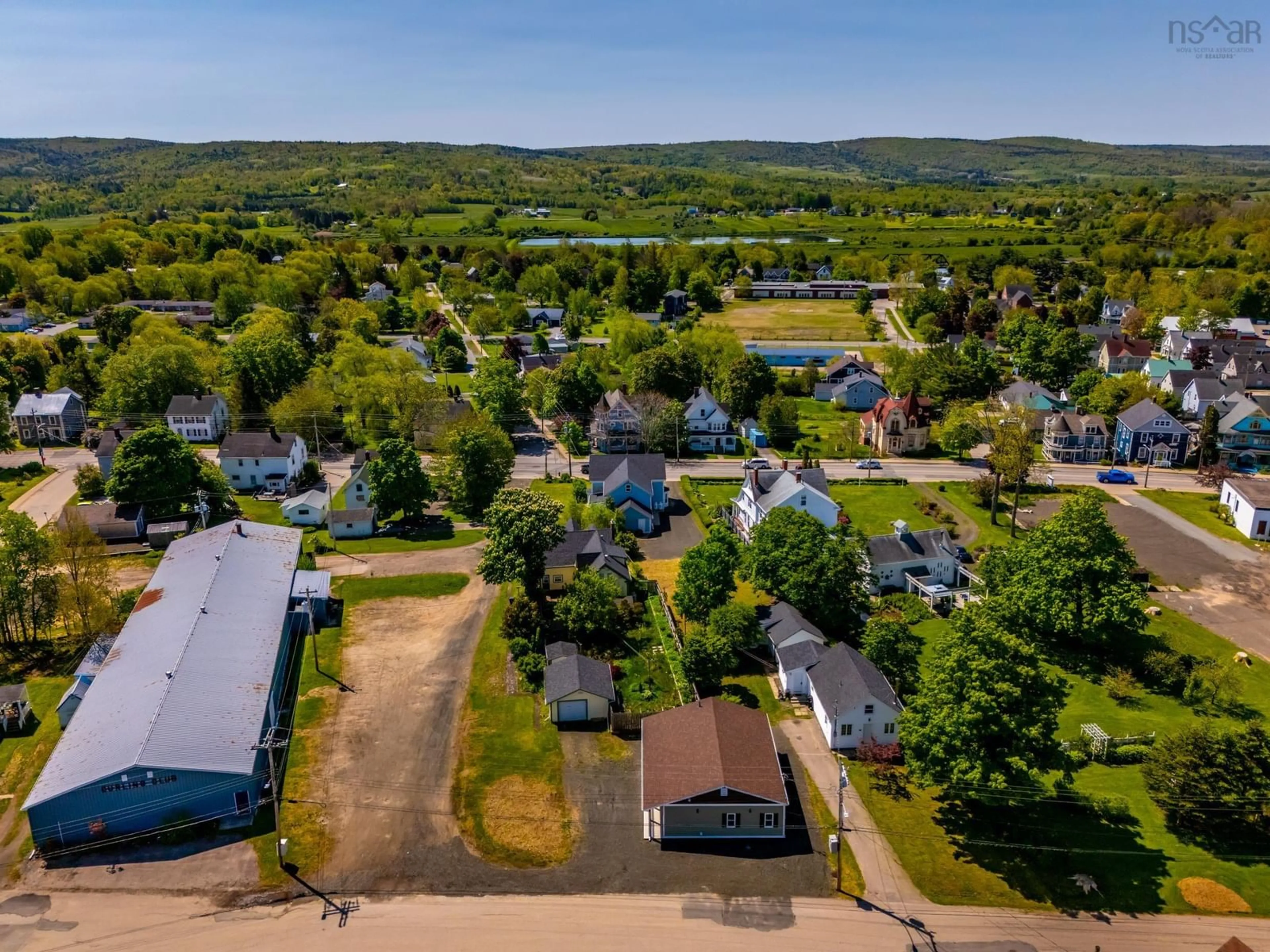 A pic from outside/outdoor area/front of a property/back of a property/a pic from drone, water/lake/river/ocean view for 17 Mckenna St, Bridgetown Nova Scotia B0S 1C0