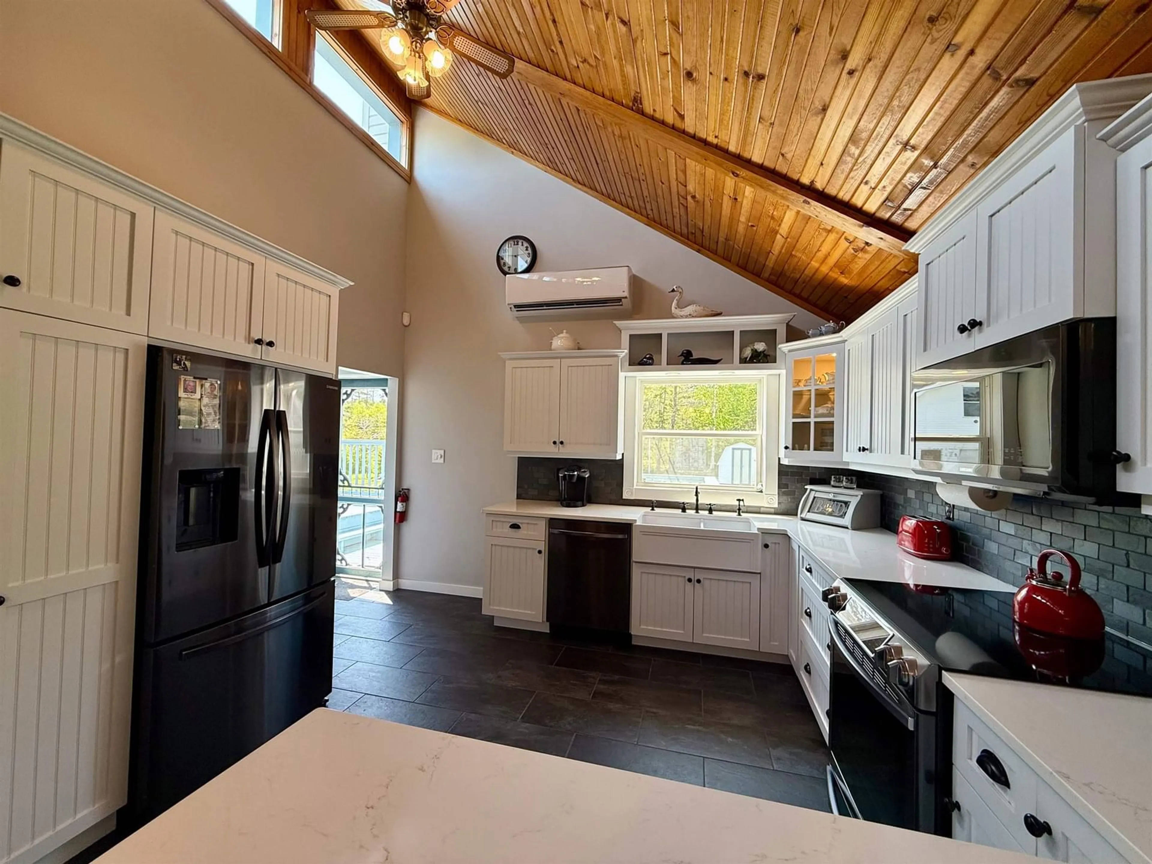 Open concept kitchen, ceramic/tile floor for 16 Chemin A Dedo Rd, Wedgeport Nova Scotia B0W 3P0