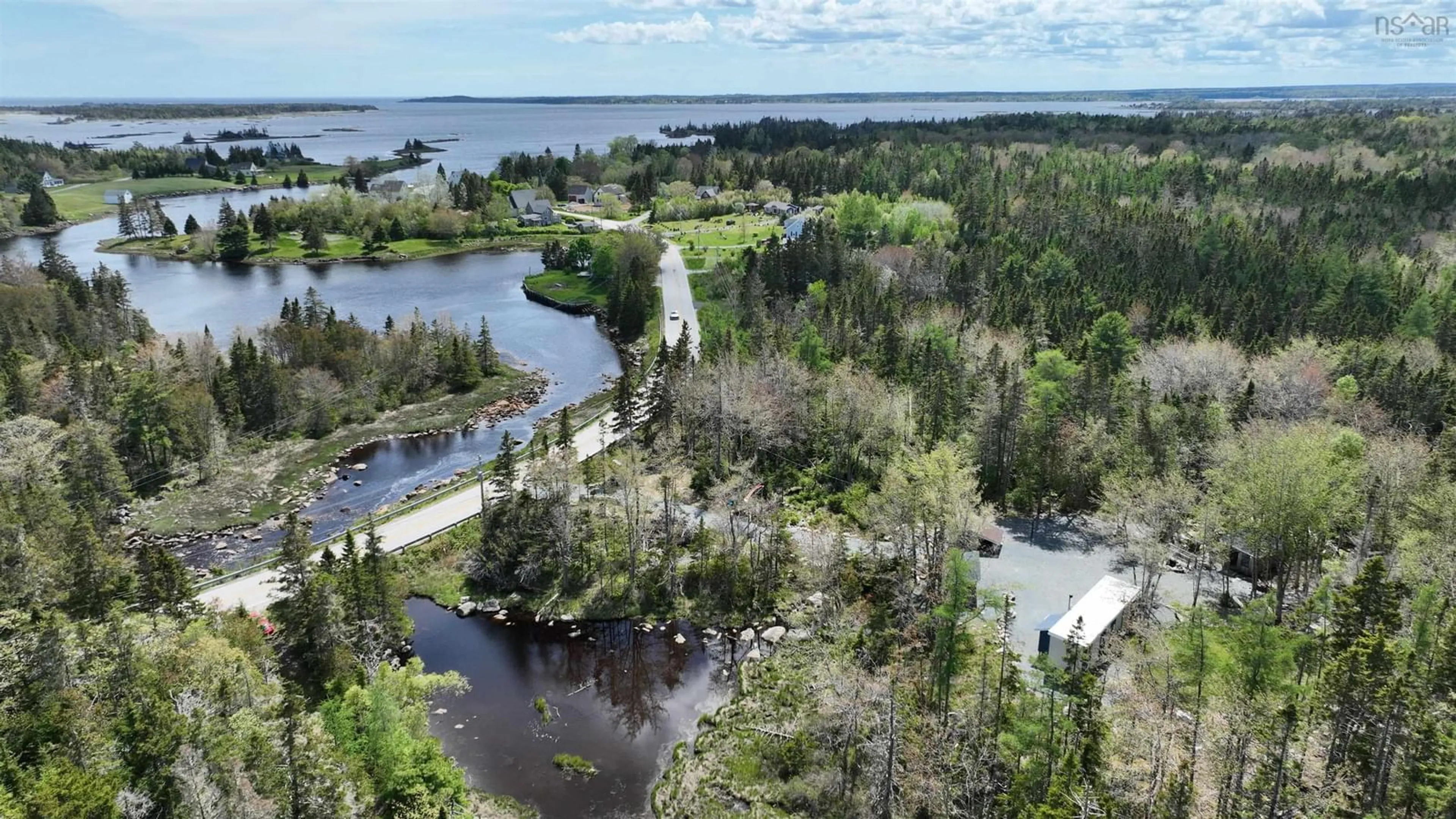A pic from outside/outdoor area/front of a property/back of a property/a pic from drone, water/lake/river/ocean view for 8630 Highway 331, Voglers Cove Nova Scotia B0J 2H0