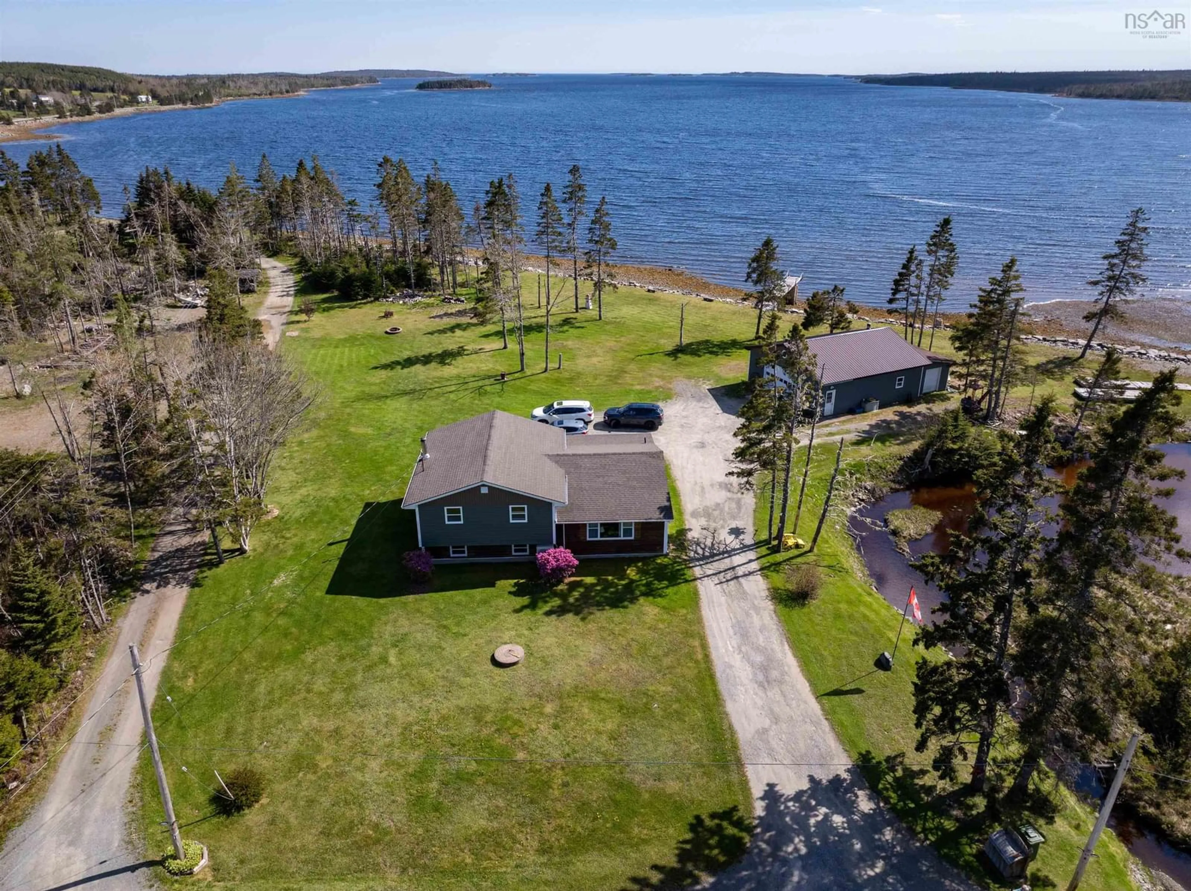 A pic from outside/outdoor area/front of a property/back of a property/a pic from drone, water/lake/river/ocean view for 276 Passage Rd, Watt Section Nova Scotia B0J 3B0
