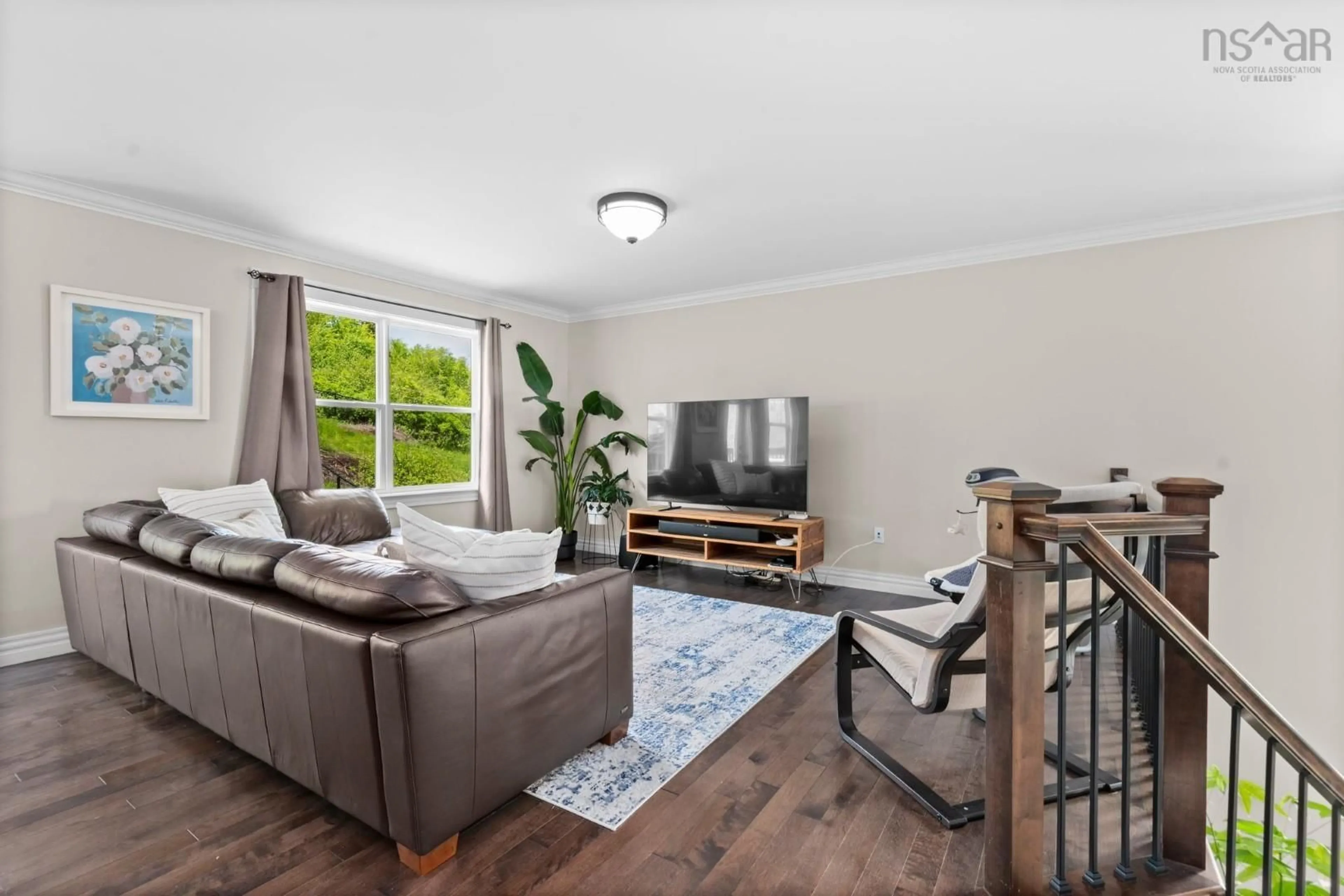 Living room with furniture, wood/laminate floor for 15 Hanwell Dr, Middle Sackville Nova Scotia B4E 0H6