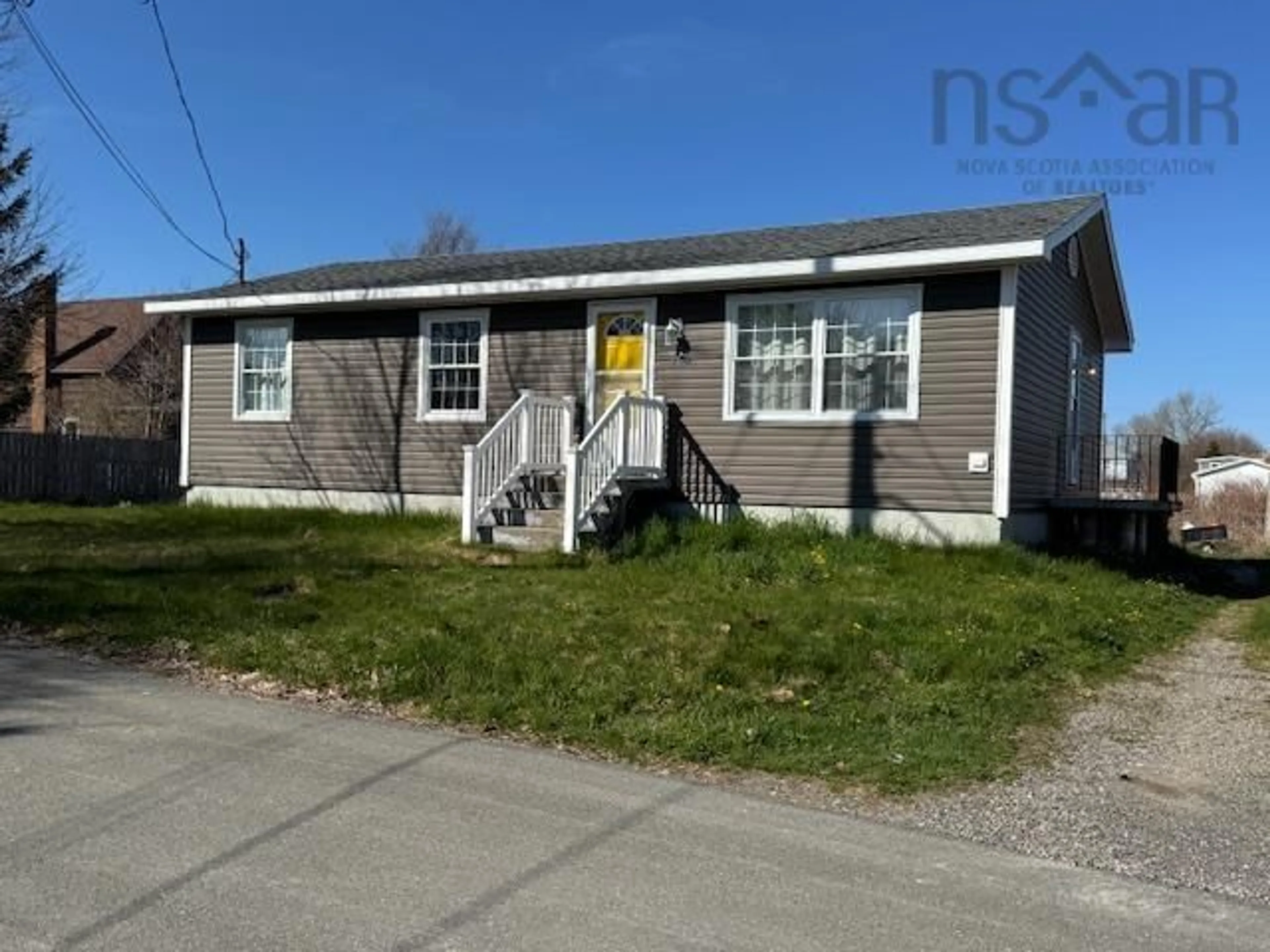 Home with vinyl exterior material, street for 19 Minto St, North Sydney Nova Scotia B2A 2R5