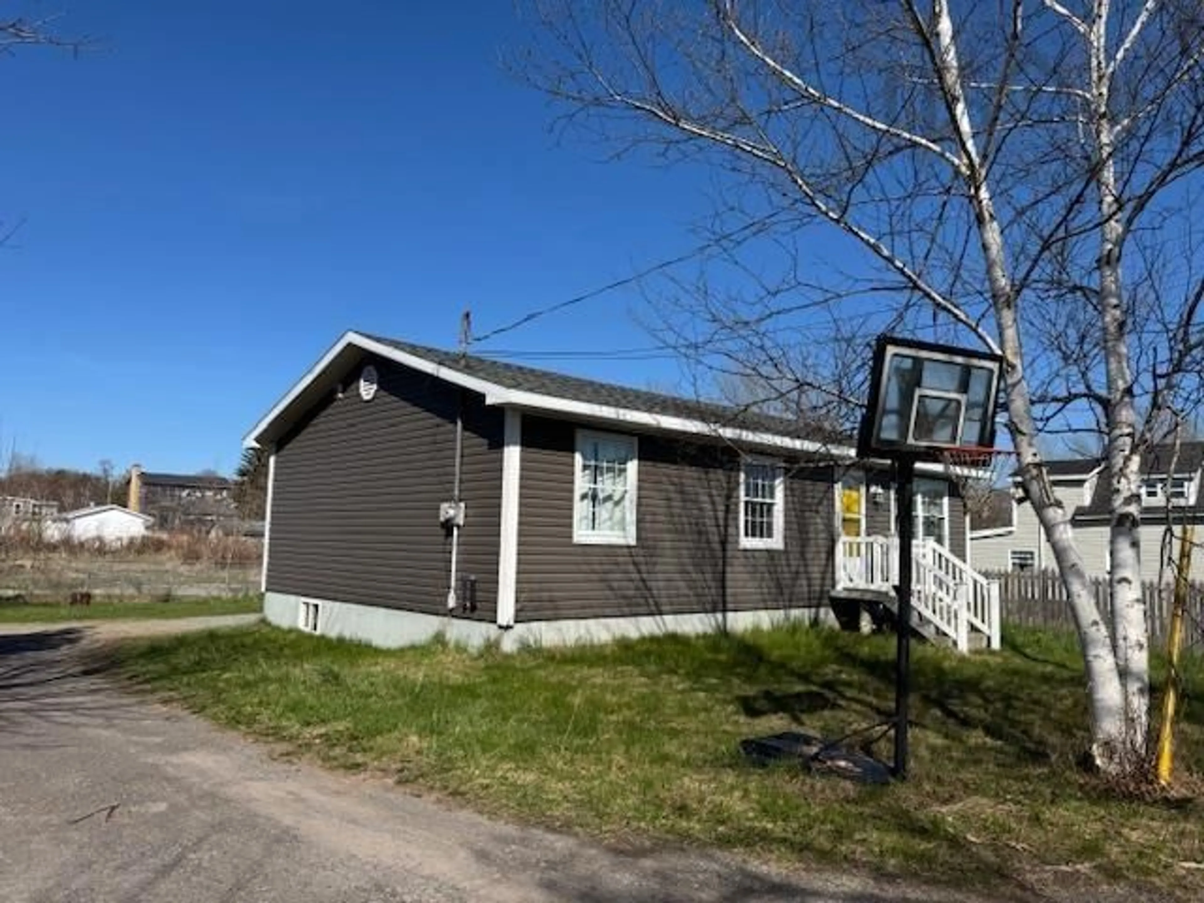 Home with vinyl exterior material, street for 19 Minto St, North Sydney Nova Scotia B2A 2R5