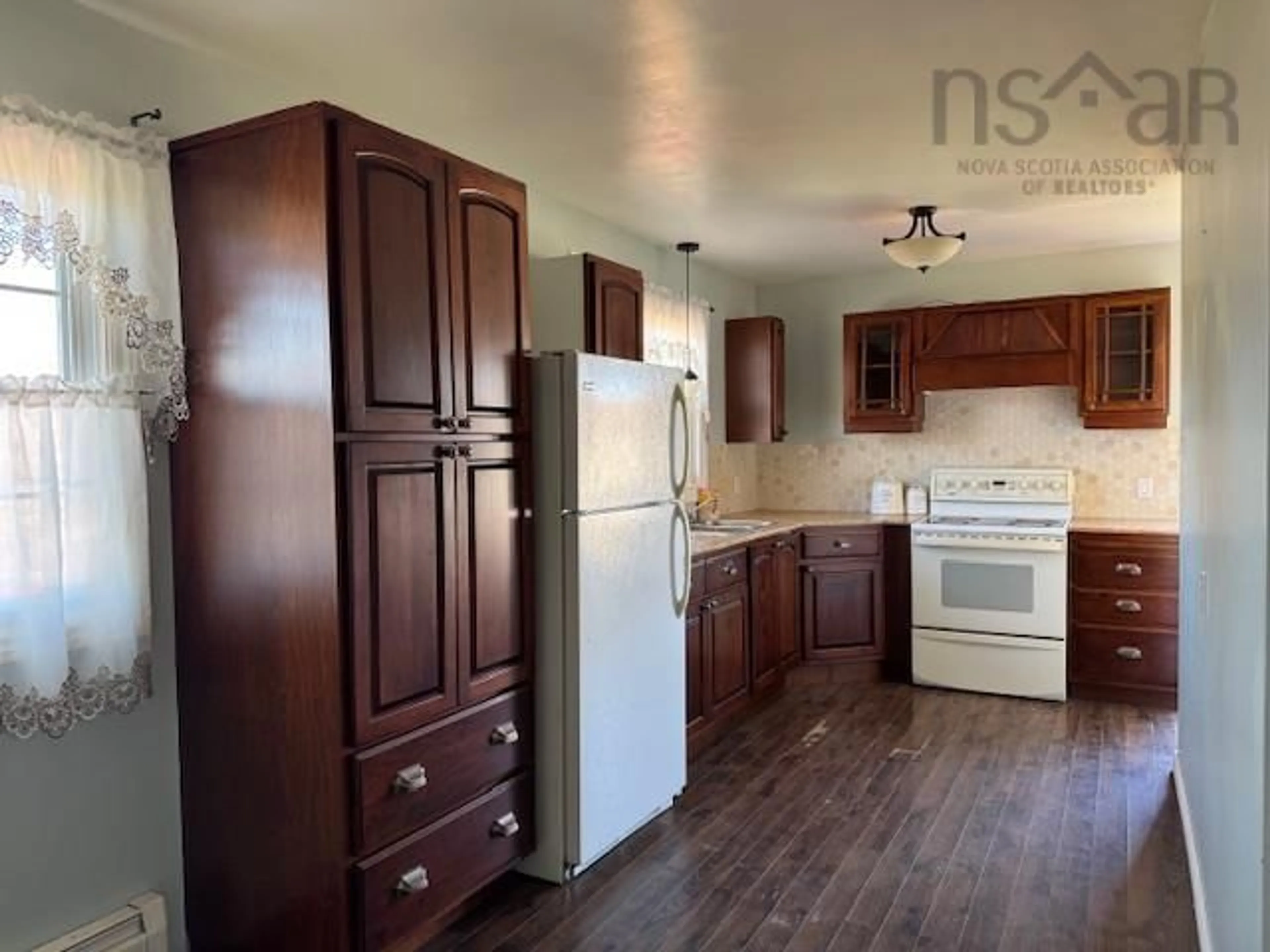 Standard kitchen, wood/laminate floor for 19 Minto St, North Sydney Nova Scotia B2A 2R5