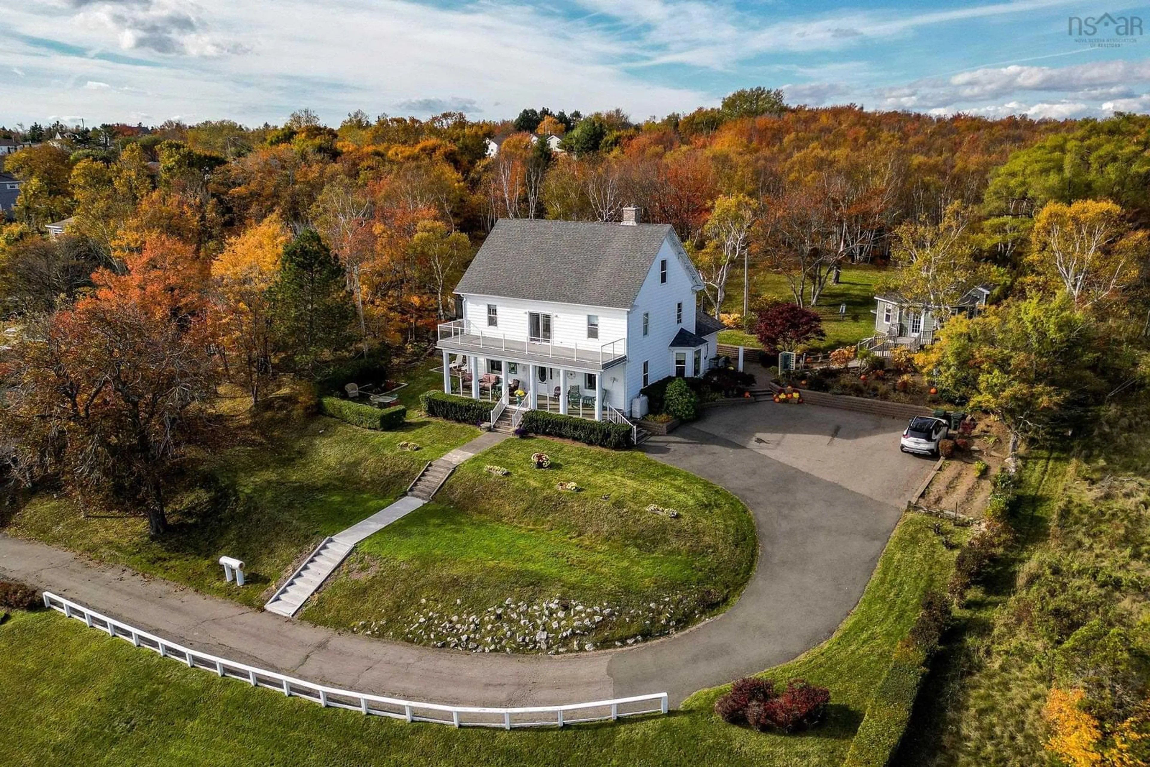 A pic from outside/outdoor area/front of a property/back of a property/a pic from drone, street for 516 Purves St, North Sydney Nova Scotia B2A 1E2