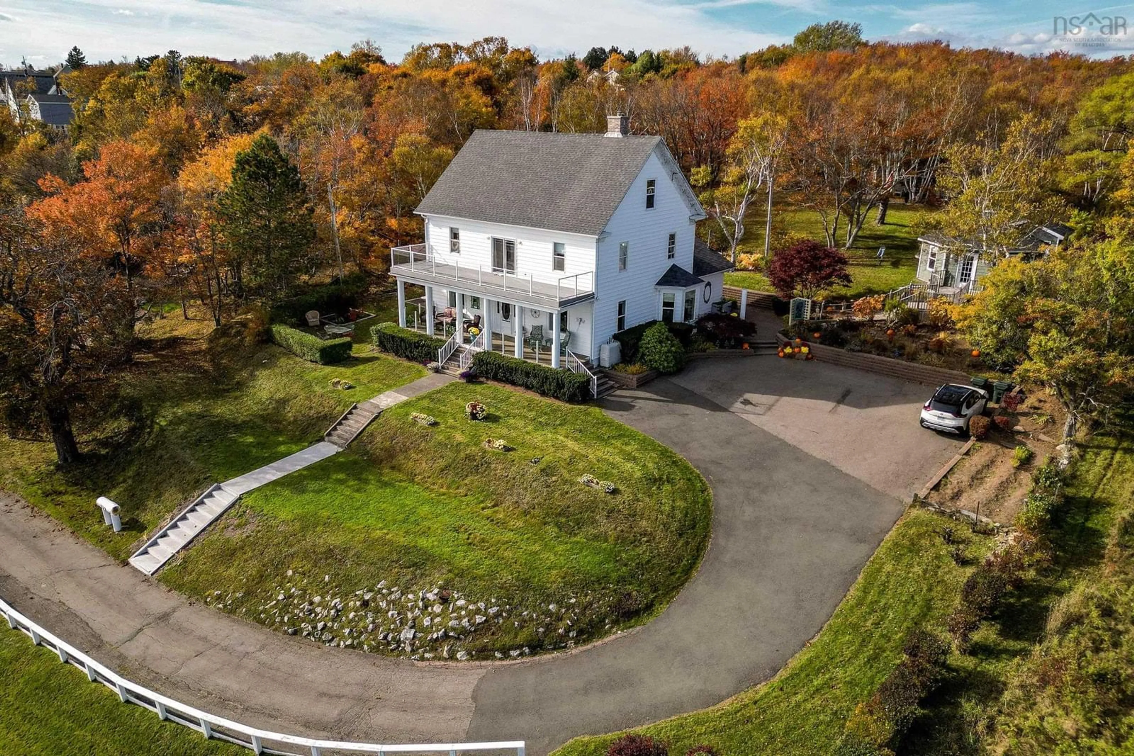 A pic from outside/outdoor area/front of a property/back of a property/a pic from drone, unknown for 516 Purves St, North Sydney Nova Scotia B2A 1E2