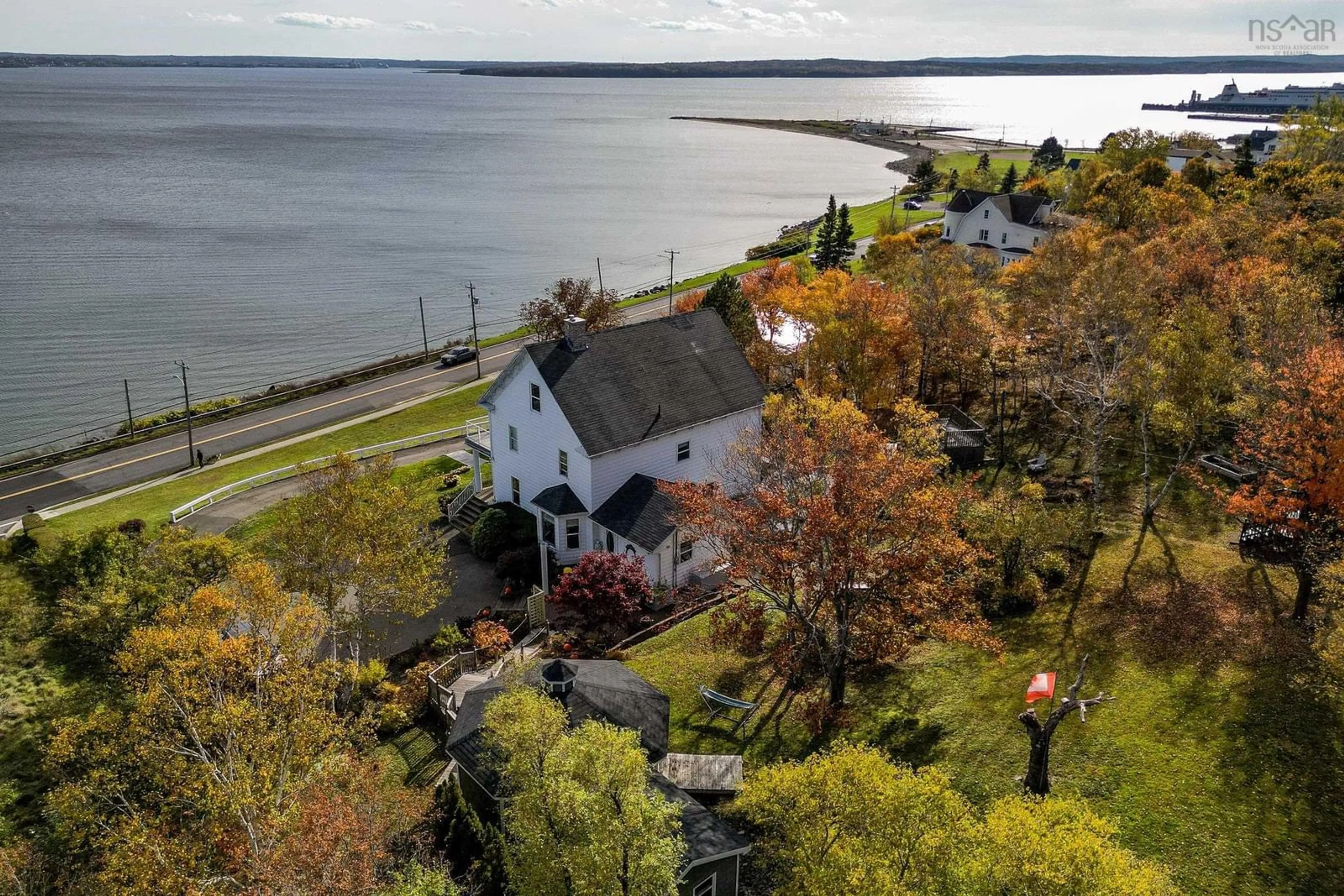 A pic from outside/outdoor area/front of a property/back of a property/a pic from drone, water/lake/river/ocean view for 516 Purves St, North Sydney Nova Scotia B2A 1E2
