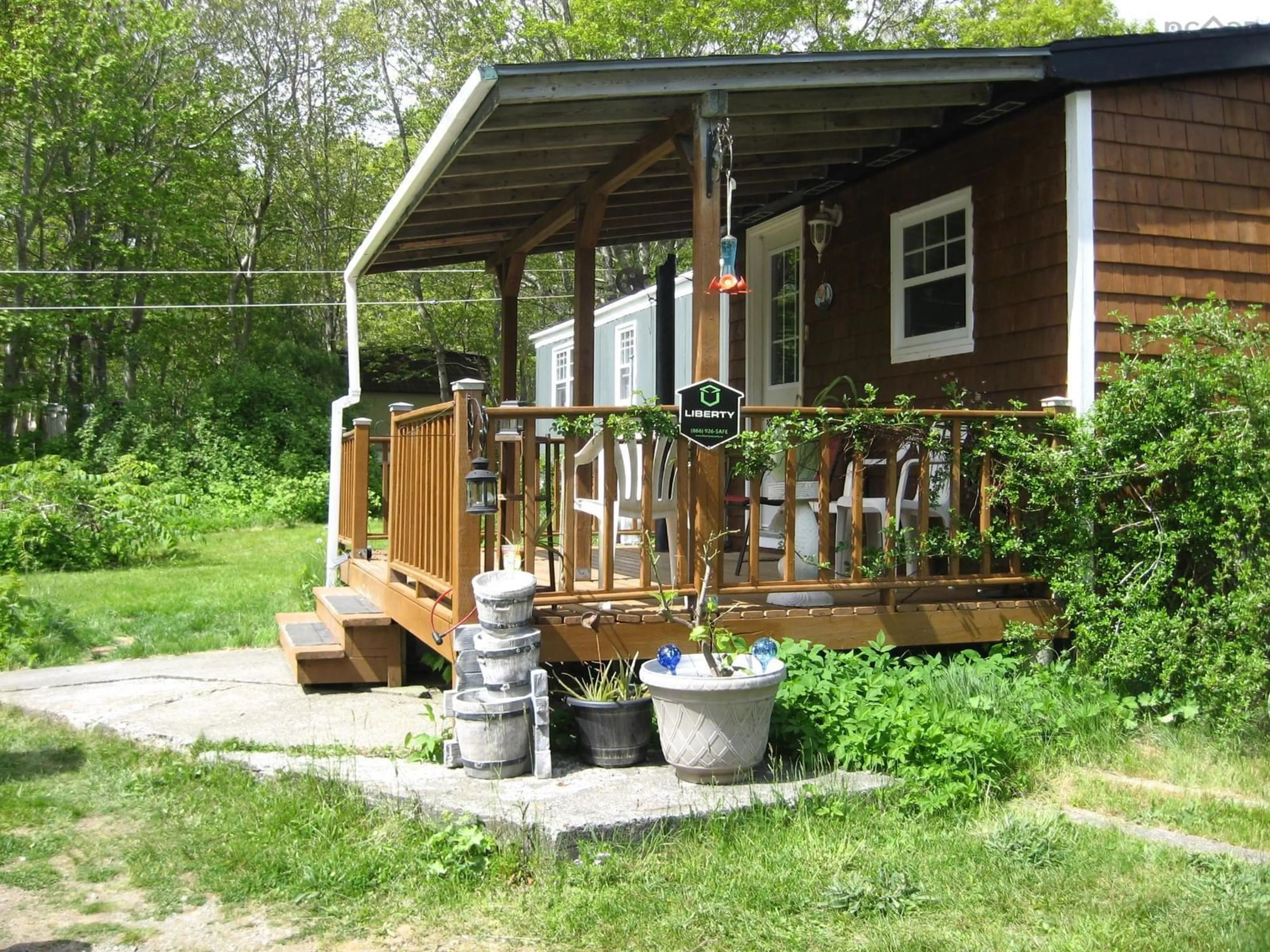 Patio, street for 22 M Smith Rd, White Point Nova Scotia B0T 1K0