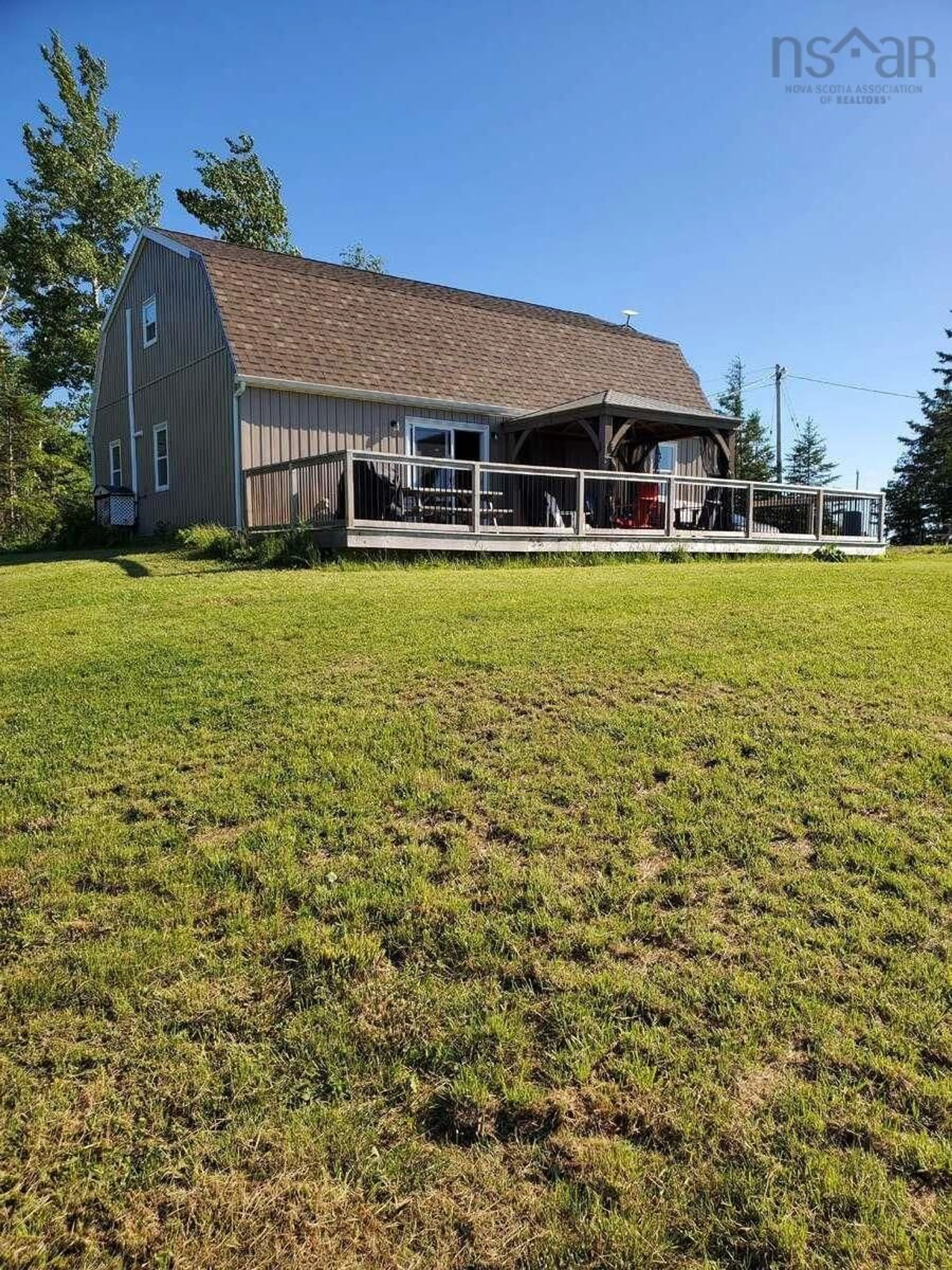 A pic from outside/outdoor area/front of a property/back of a property/a pic from drone, water/lake/river/ocean view for 995 Smithville Rd, Mabou Nova Scotia B0E 1X0