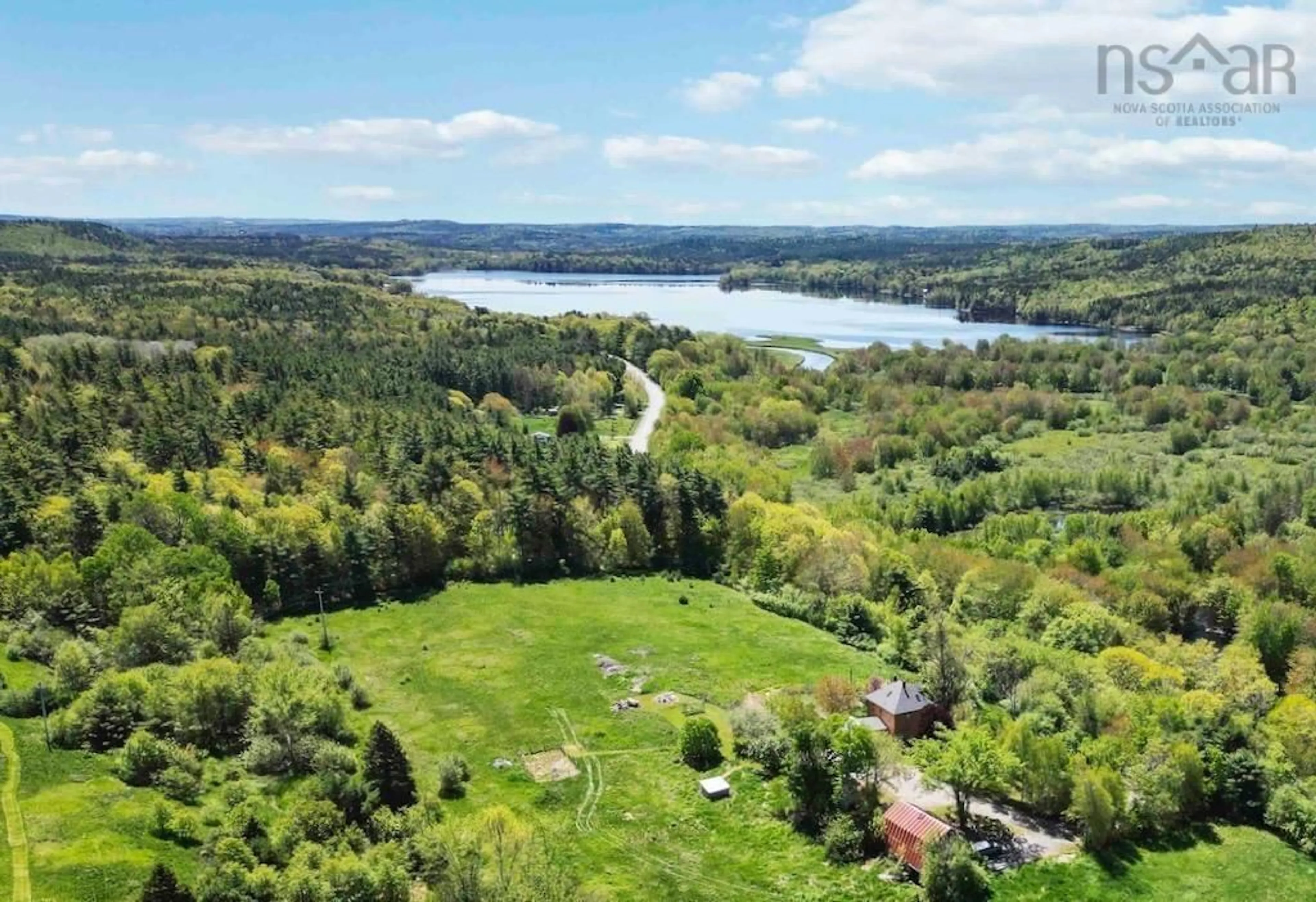 A pic from outside/outdoor area/front of a property/back of a property/a pic from drone, water/lake/river/ocean view for 3330 Highway 10, Pinehurst Nova Scotia B0R 1E0