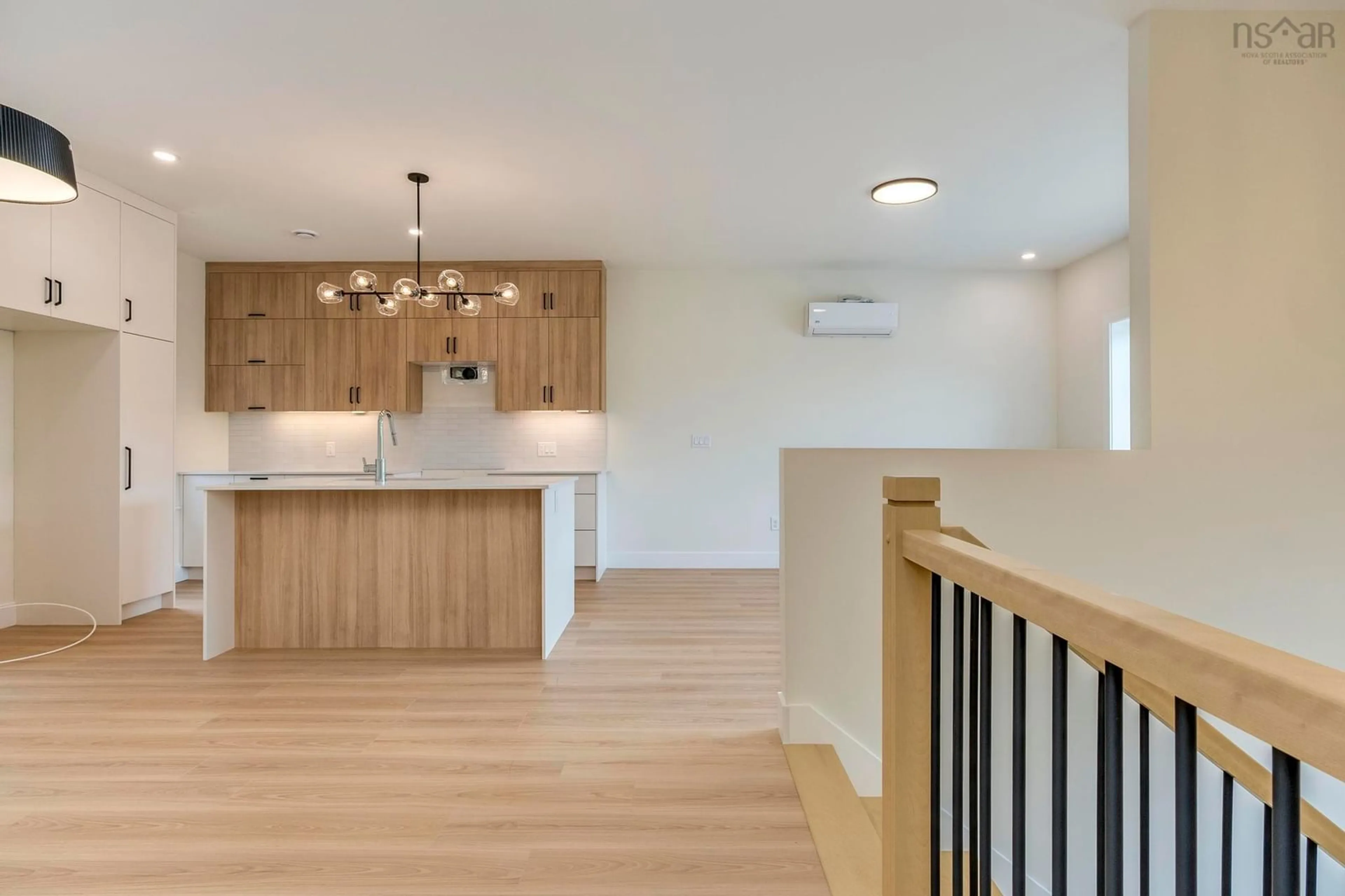 Open concept kitchen, wood/laminate floor for 44 Sweetfern Lane, Middle Sackville Nova Scotia B4E 0W8