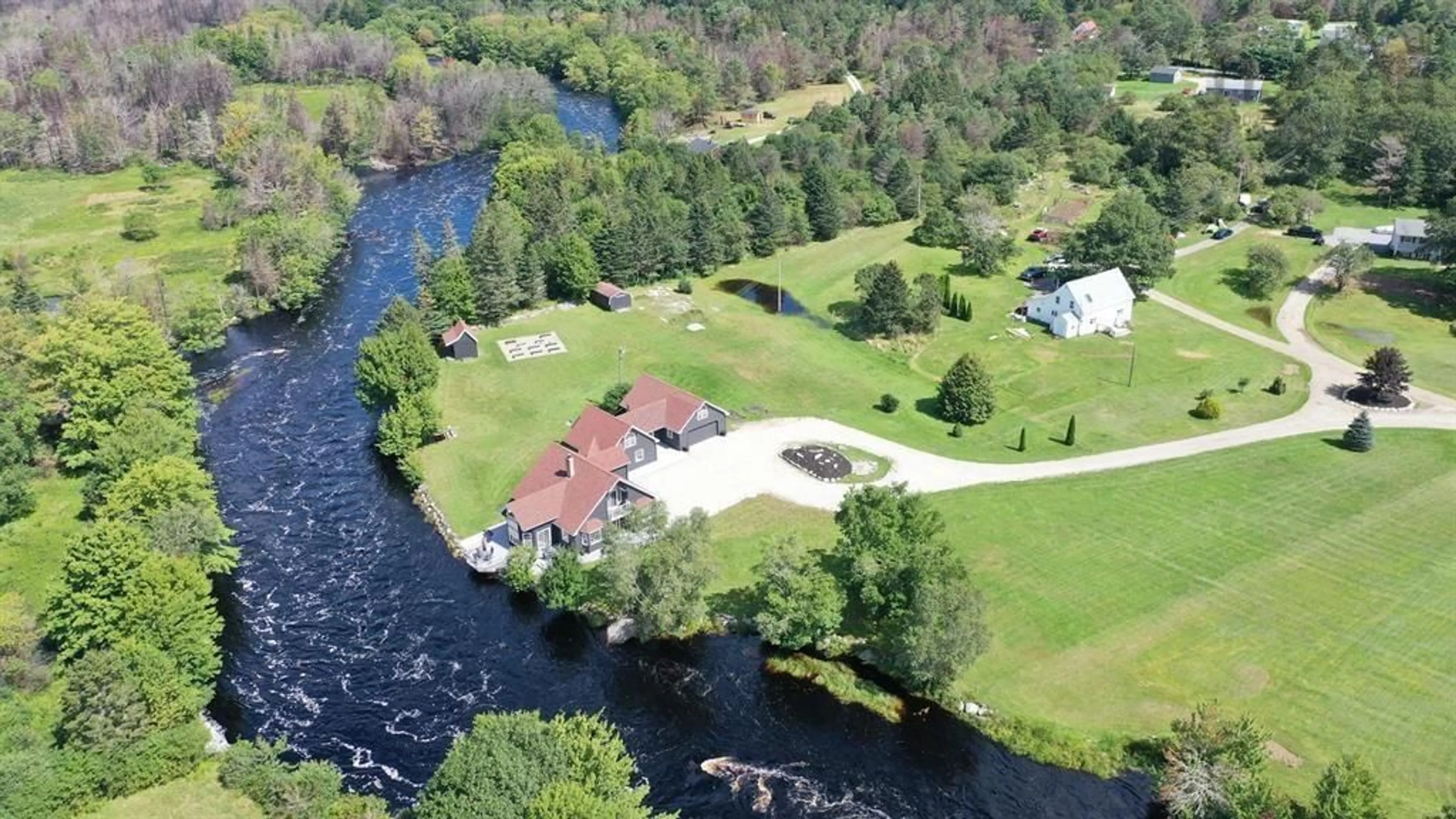 A pic from outside/outdoor area/front of a property/back of a property/a pic from drone, water/lake/river/ocean view for 41 Post Office Rd, Clyde River Nova Scotia B0W 1R0
