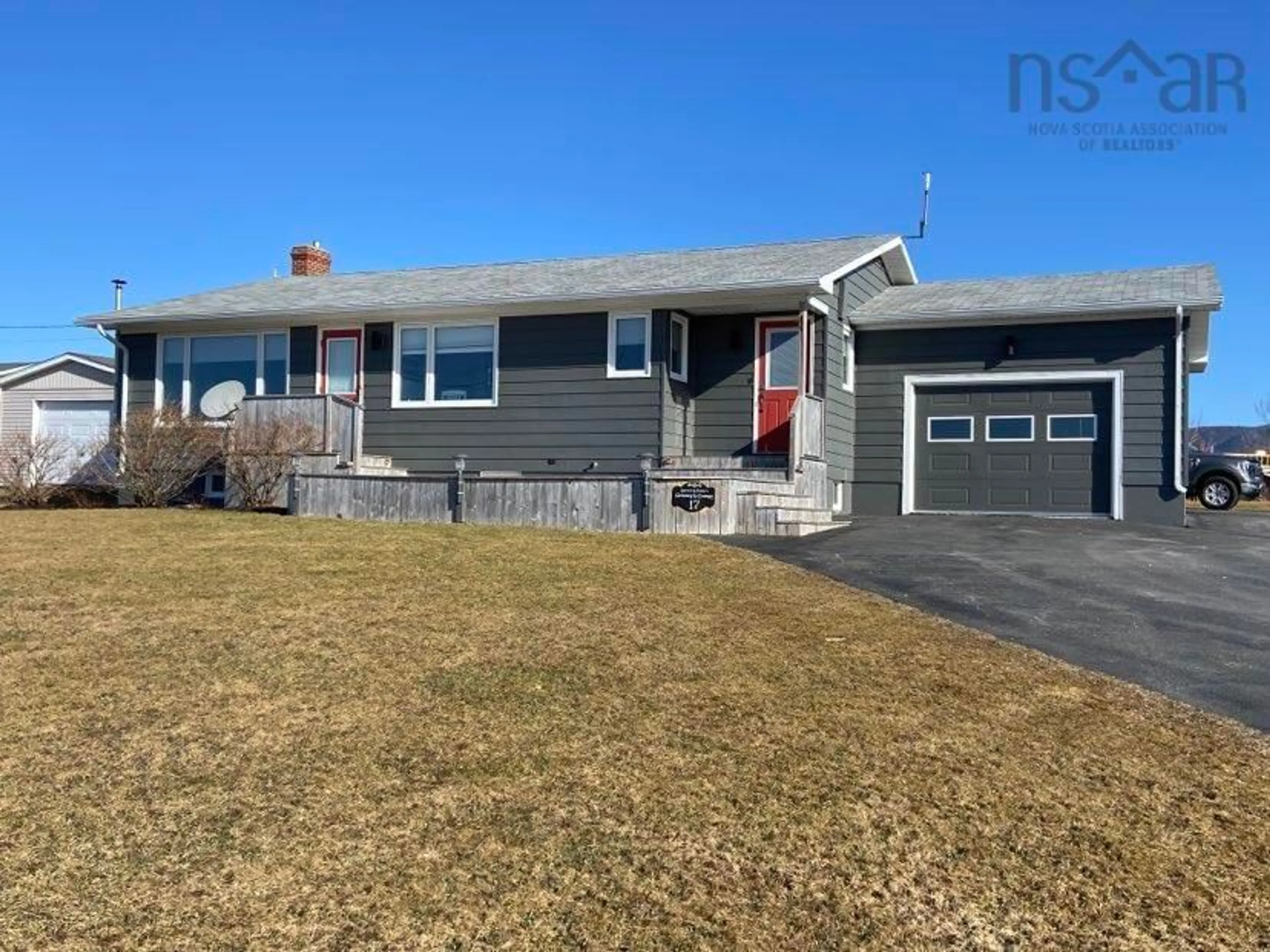 Home with vinyl exterior material, street for 17 Chemin De Susanne Rd, Chéticamp Nova Scotia B0E 1H0
