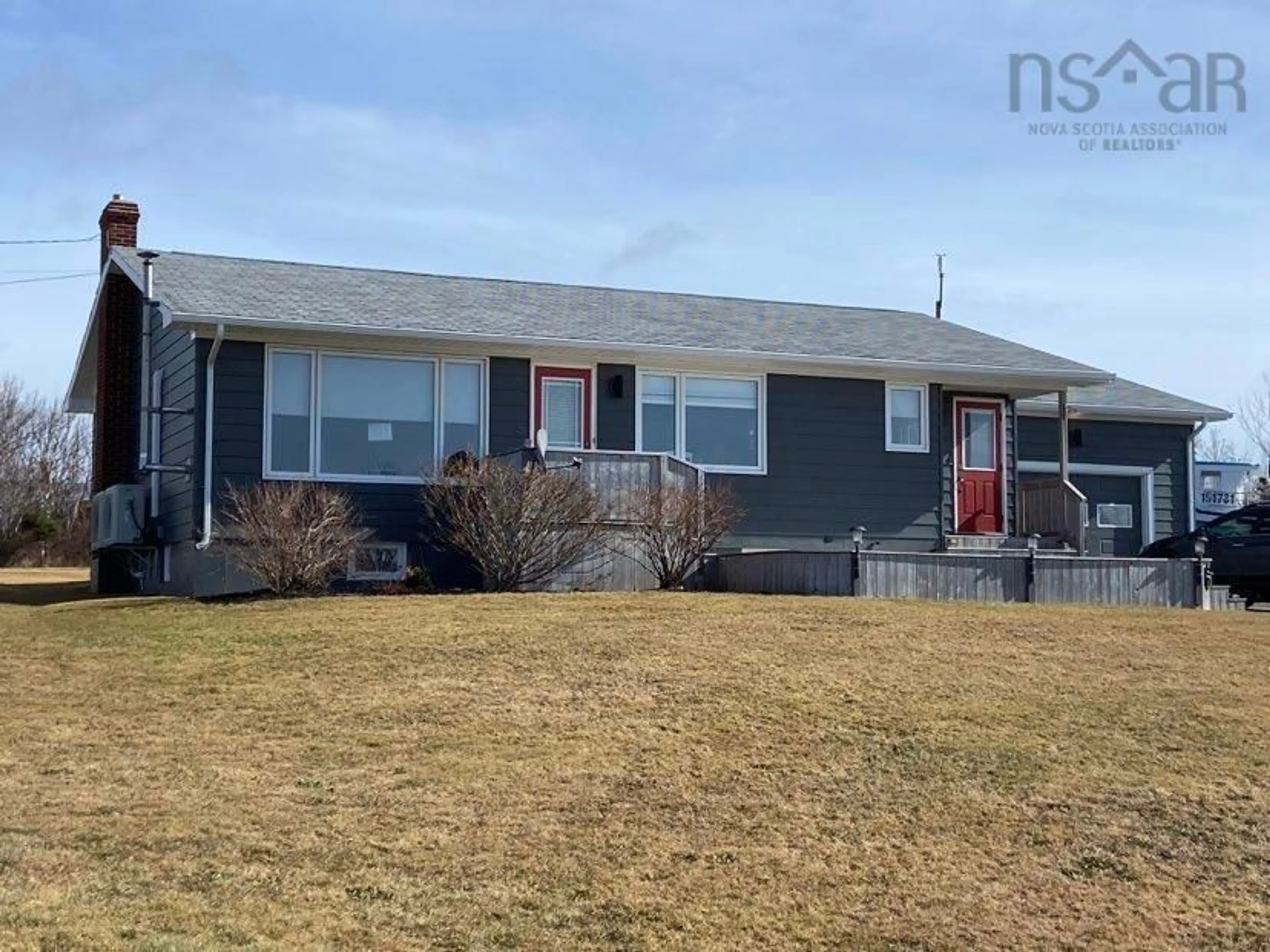 Home with vinyl exterior material, street for 17 Chemin De Susanne Rd, Chéticamp Nova Scotia B0E 1H0