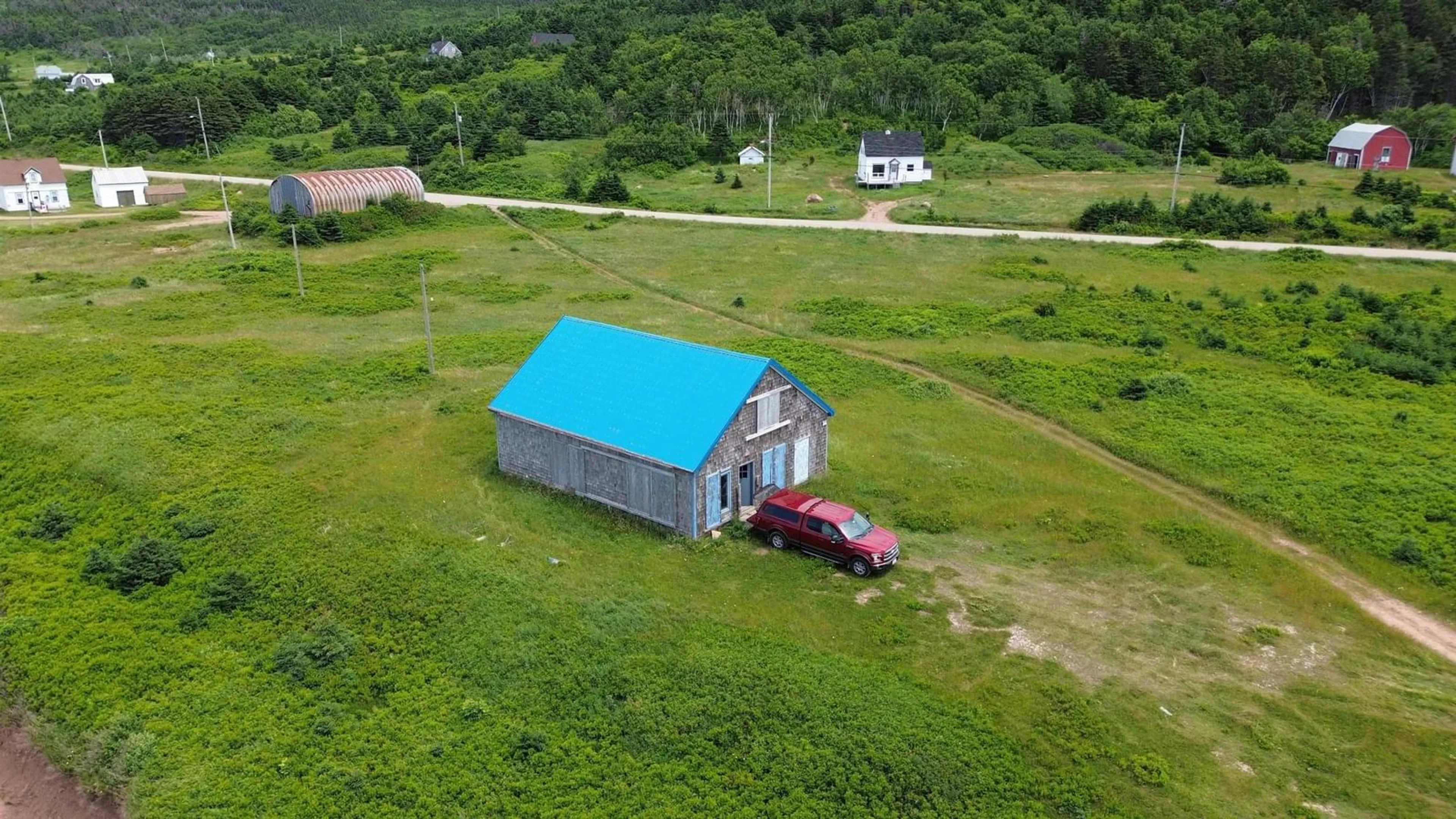 A pic from outside/outdoor area/front of a property/back of a property/a pic from drone, building for 99 Pleasant Bay Loop, Pleasant Bay Nova Scotia B0E 1H0