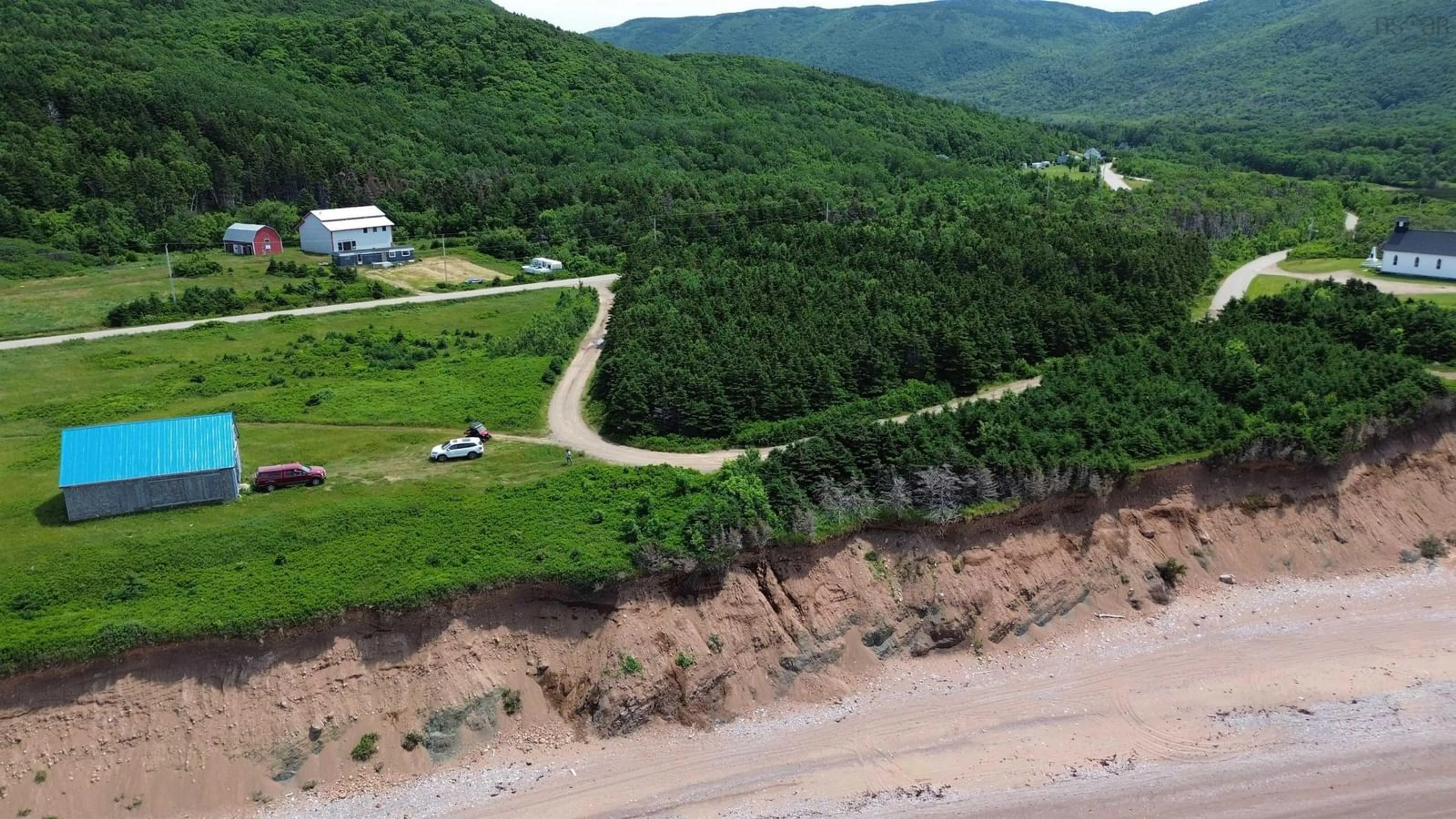 A pic from outside/outdoor area/front of a property/back of a property/a pic from drone, water/lake/river/ocean view for 99 Pleasant Bay Loop, Pleasant Bay Nova Scotia B0E 1H0