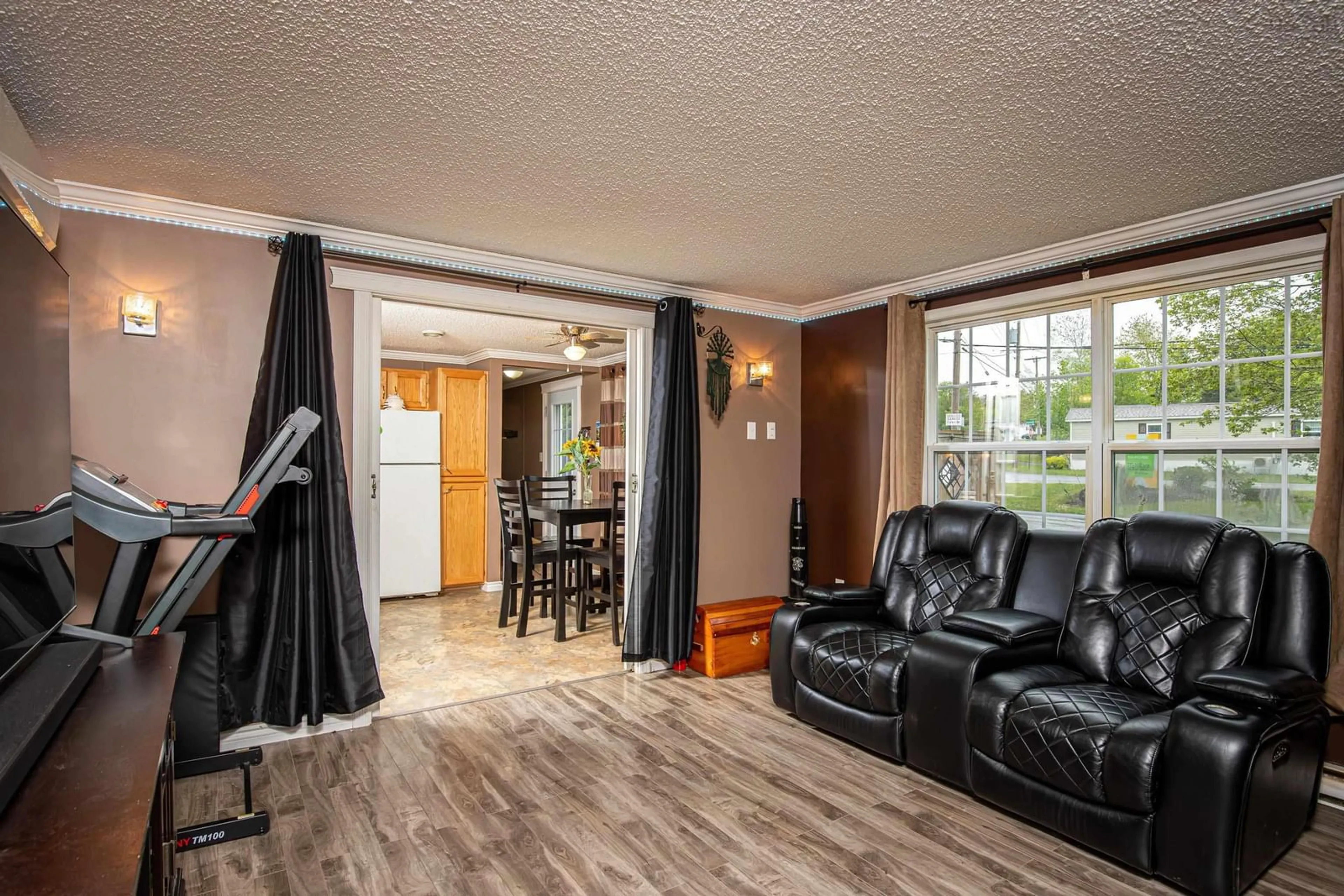 Living room with furniture, wood/laminate floor for 170 Circle Dr, Lake Echo Nova Scotia B3E 1C1