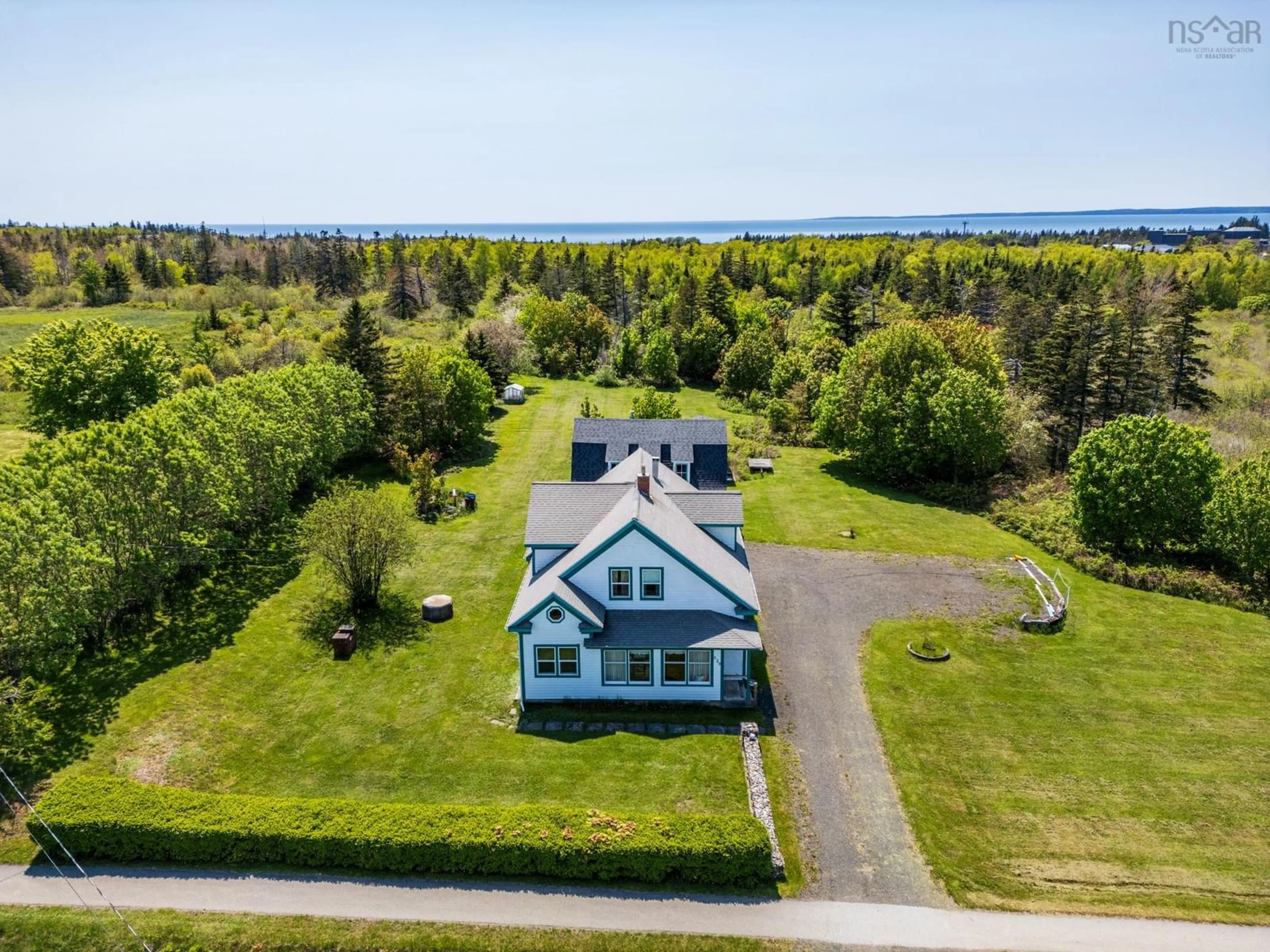 A pic from outside/outdoor area/front of a property/back of a property/a pic from drone, water/lake/river/ocean view for 328 Patrice Road, Church Point Nova Scotia B0W 1M0