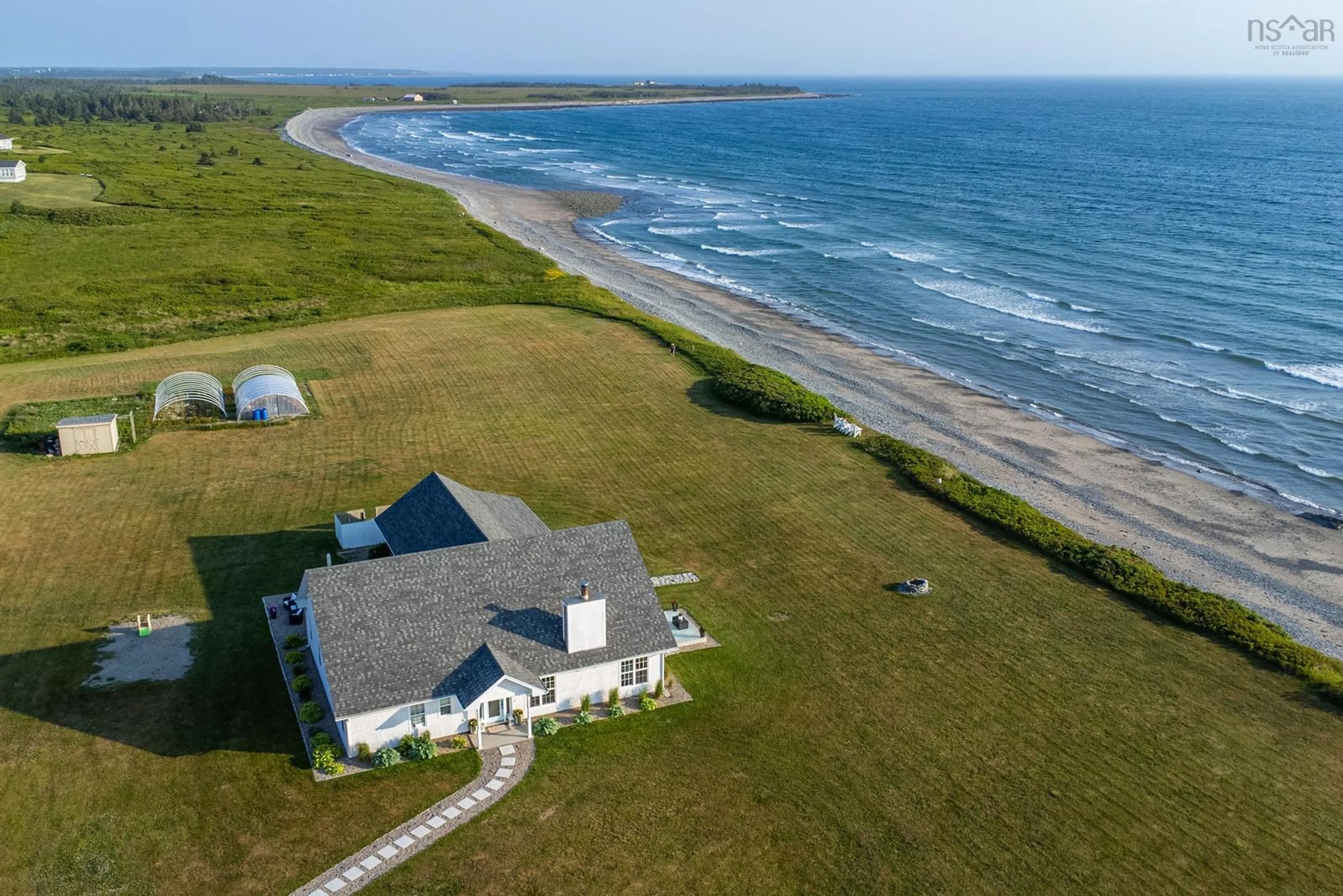 A pic from outside/outdoor area/front of a property/back of a property/a pic from drone, water/lake/river/ocean view for 4849 Highway 1, Salmon River Nova Scotia B0W 2Y0