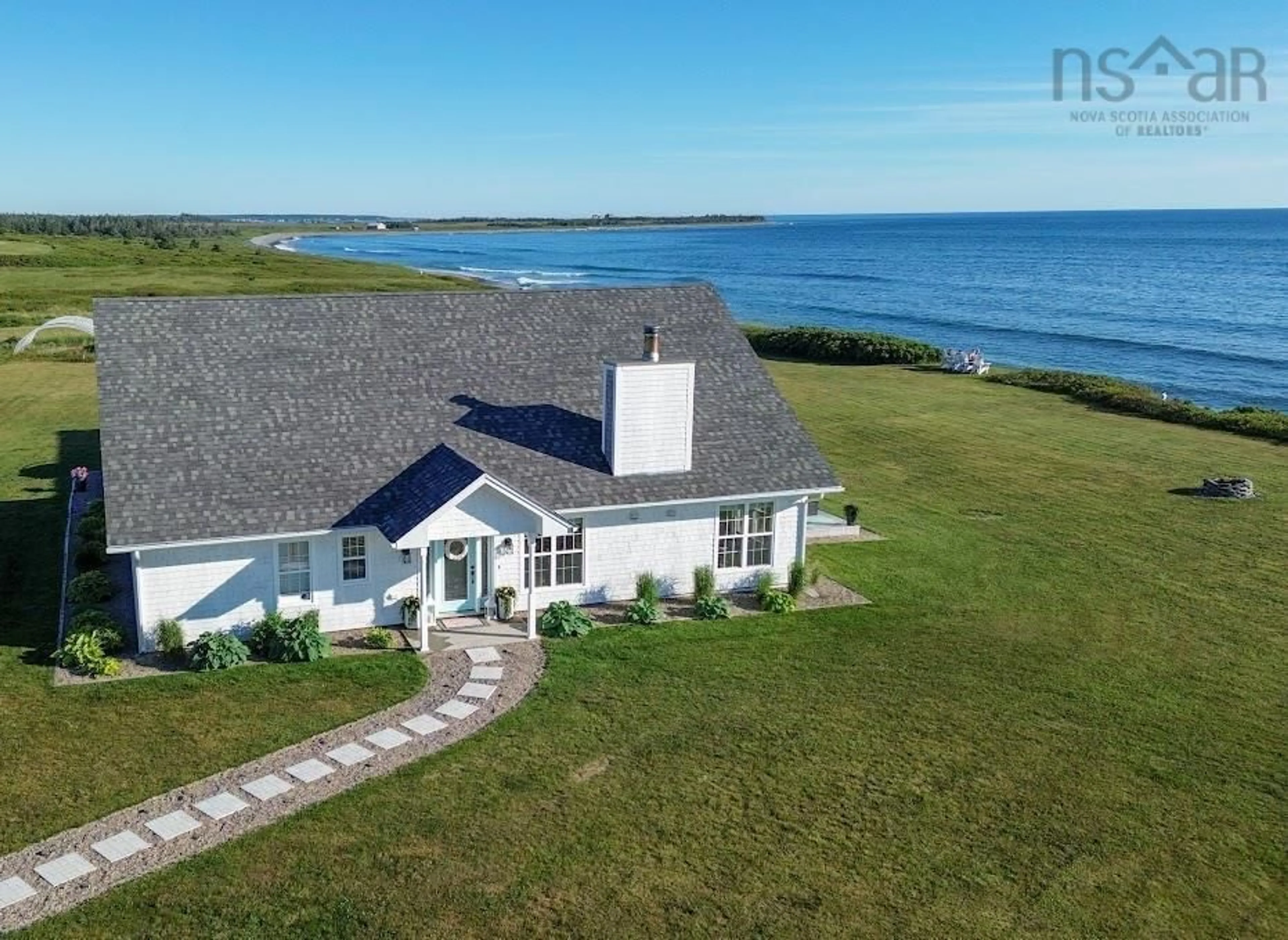 A pic from outside/outdoor area/front of a property/back of a property/a pic from drone, water/lake/river/ocean view for 4849 Highway 1, Salmon River Nova Scotia B0W 2Y0