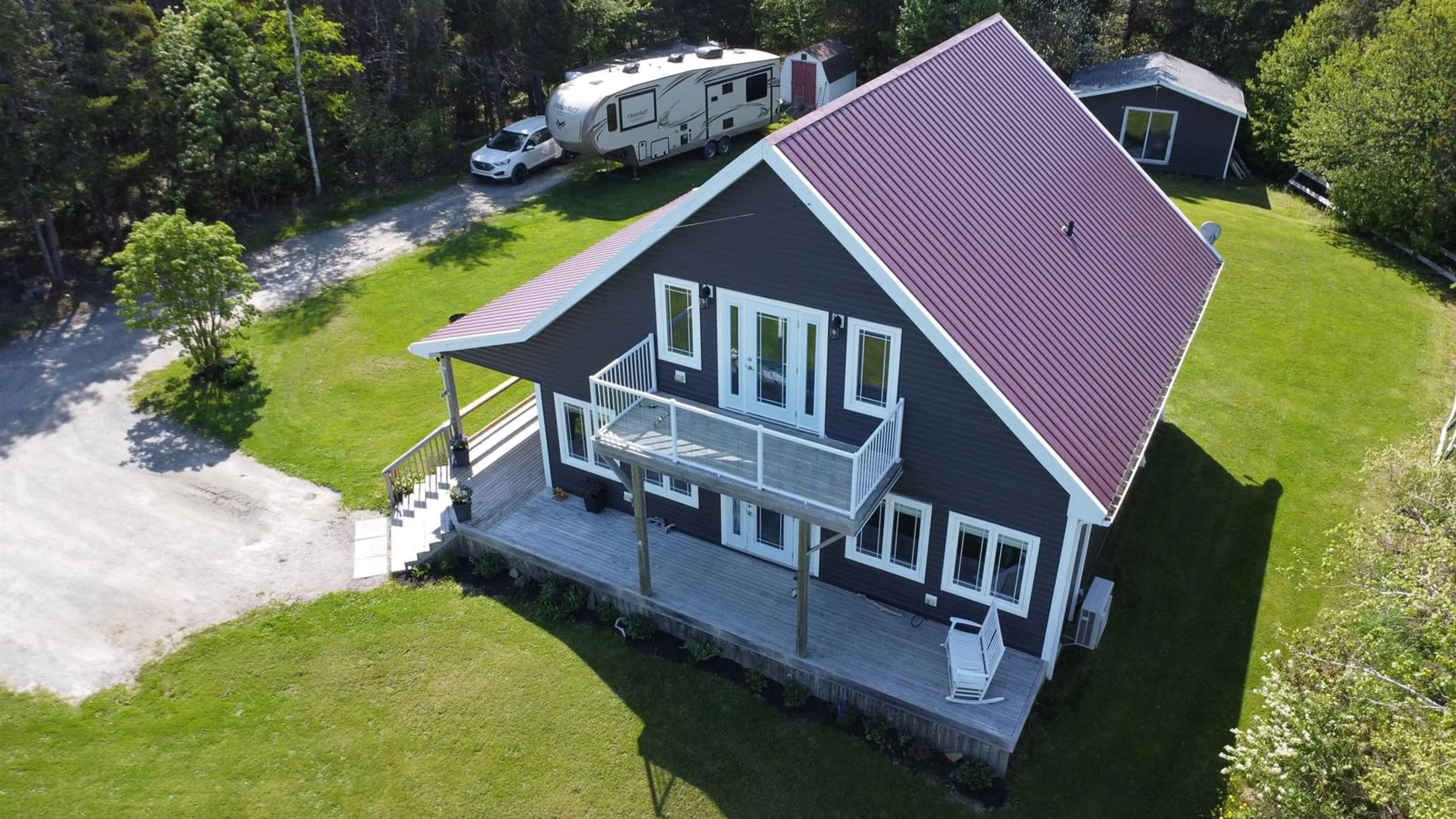 A pic from outside/outdoor area/front of a property/back of a property/a pic from drone, unknown for 1741 Havre Boucher Road Rd, Havre Boucher Nova Scotia B0H 1P0