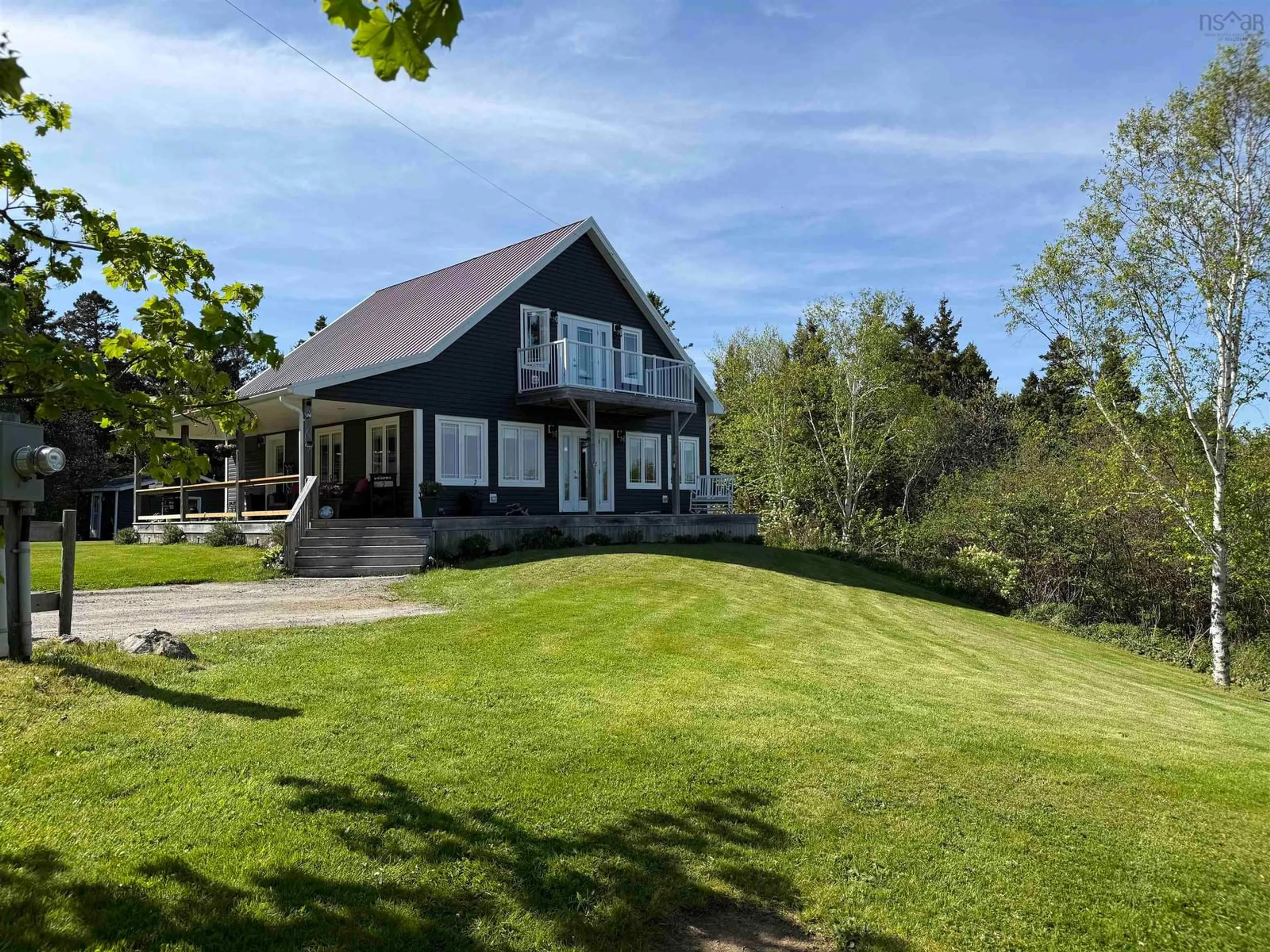 A pic from outside/outdoor area/front of a property/back of a property/a pic from drone, water/lake/river/ocean view for 1741 Havre Boucher Road Rd, Havre Boucher Nova Scotia B0H 1P0