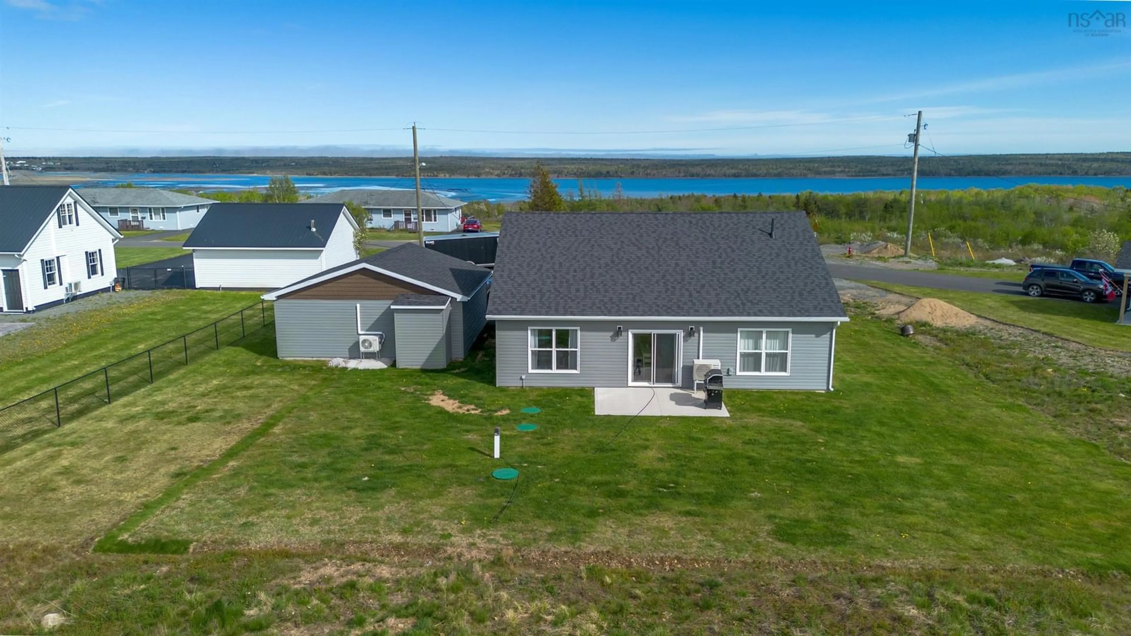 A pic from outside/outdoor area/front of a property/back of a property/a pic from drone, water/lake/river/ocean view for 72 Drew St, Glace Bay Nova Scotia B1A 0A1