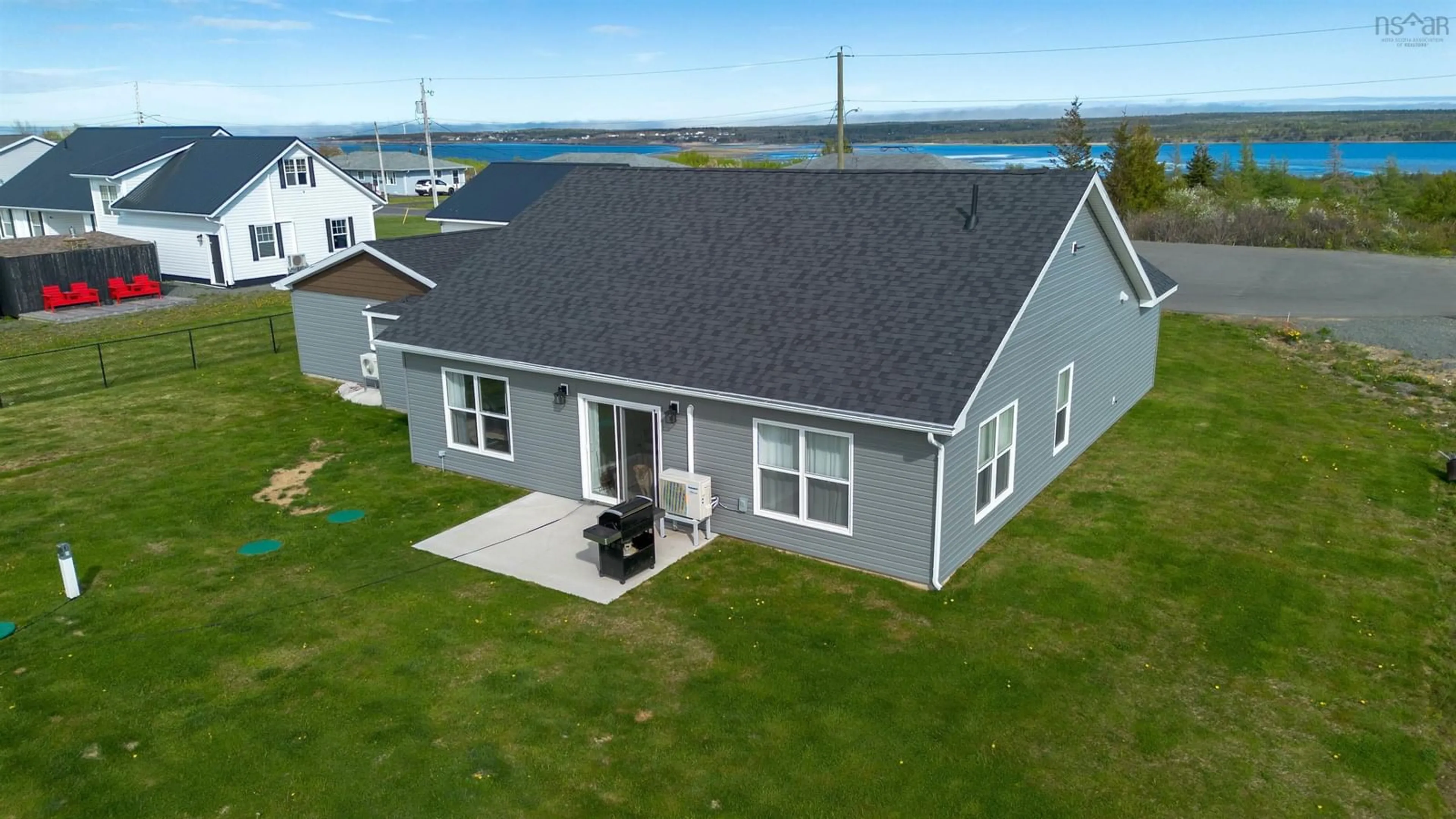 A pic from outside/outdoor area/front of a property/back of a property/a pic from drone, water/lake/river/ocean view for 72 Drew St, Glace Bay Nova Scotia B1A 0A1