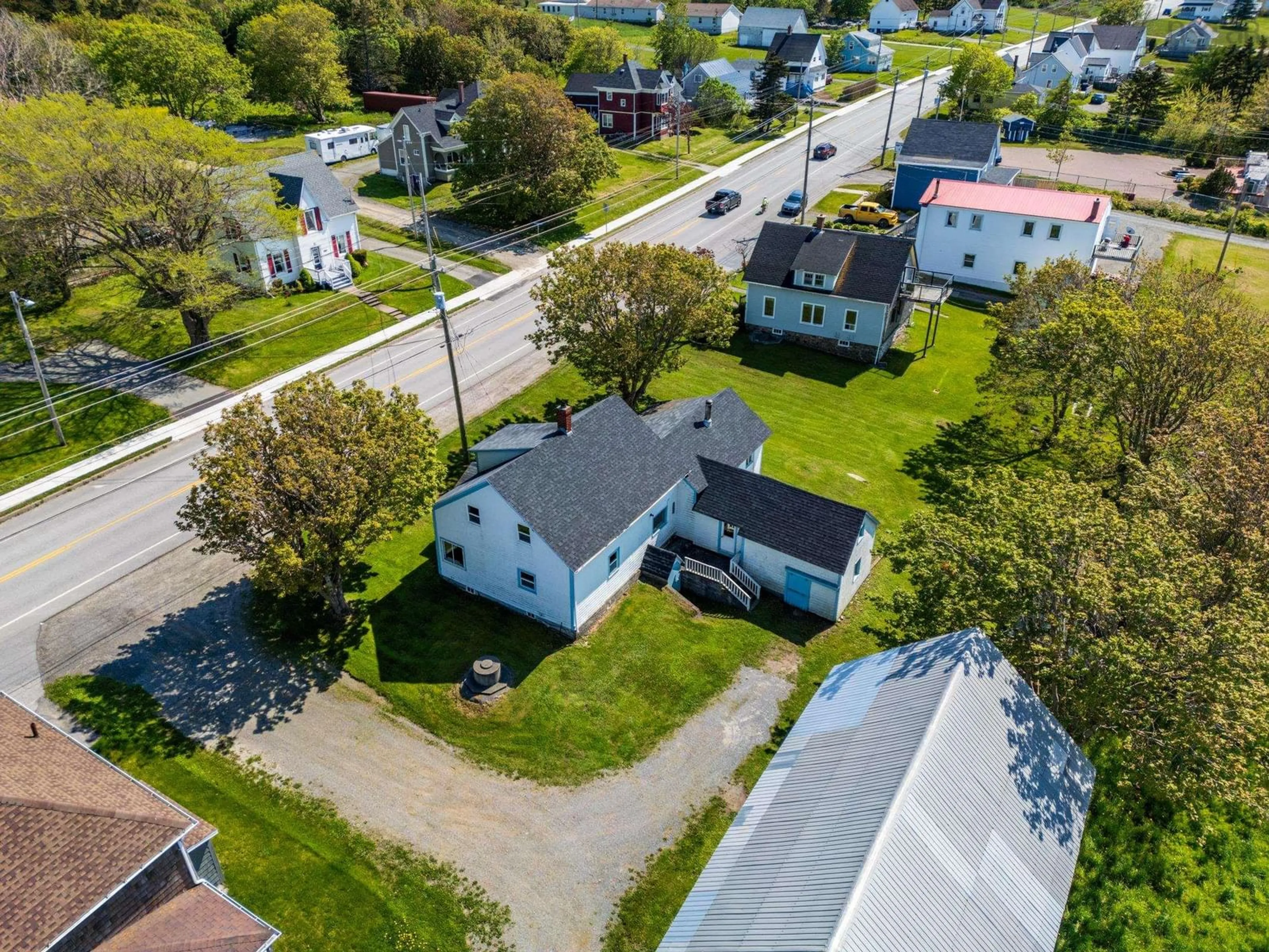 A pic from outside/outdoor area/front of a property/back of a property/a pic from drone, street for 8167 Highway 1, Meteghan Nova Scotia B0W 2J0