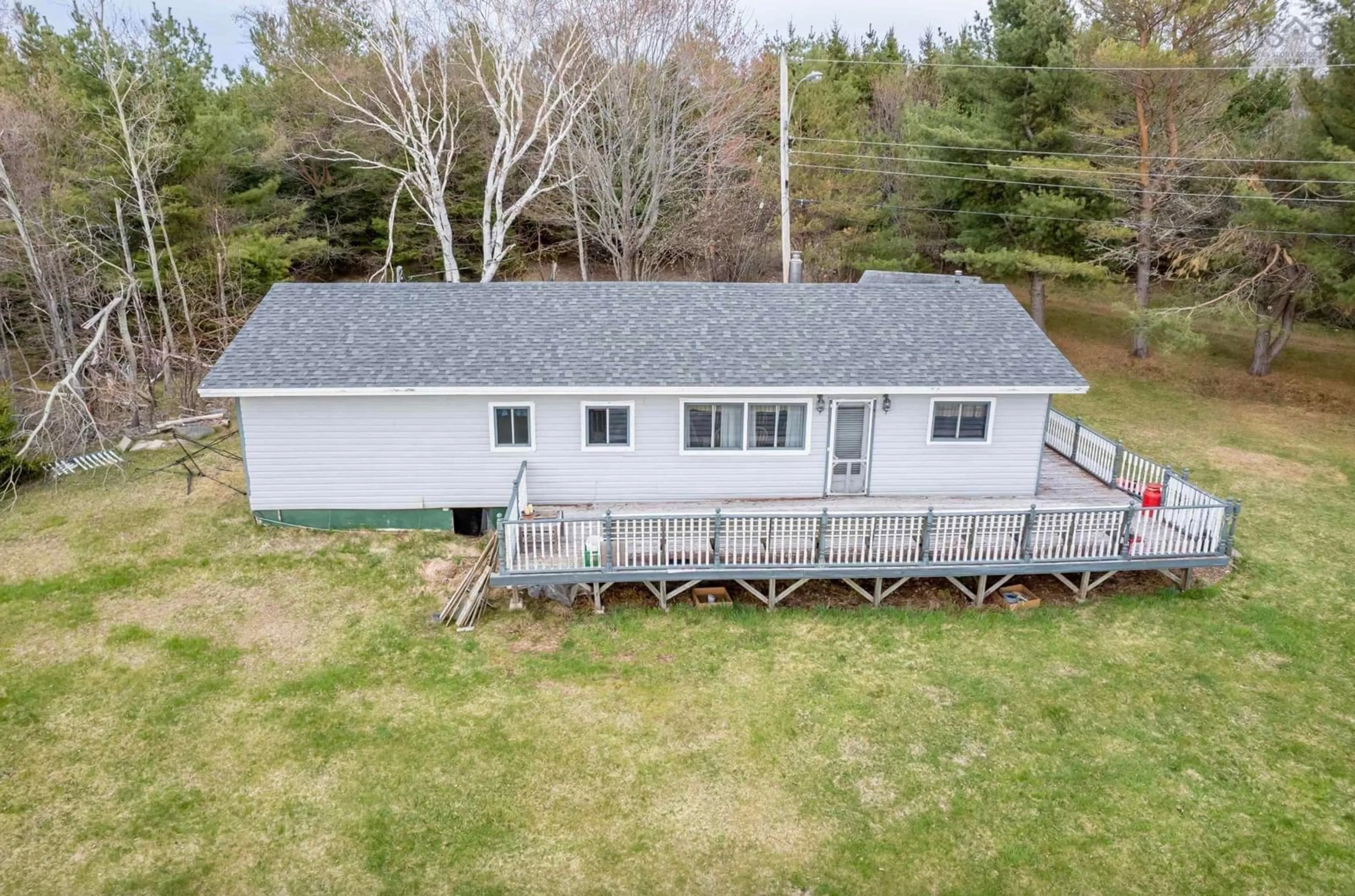 A pic from outside/outdoor area/front of a property/back of a property/a pic from drone, water/lake/river/ocean view for 19 Channel Rd, Boisdale Nova Scotia B1Y 3T2