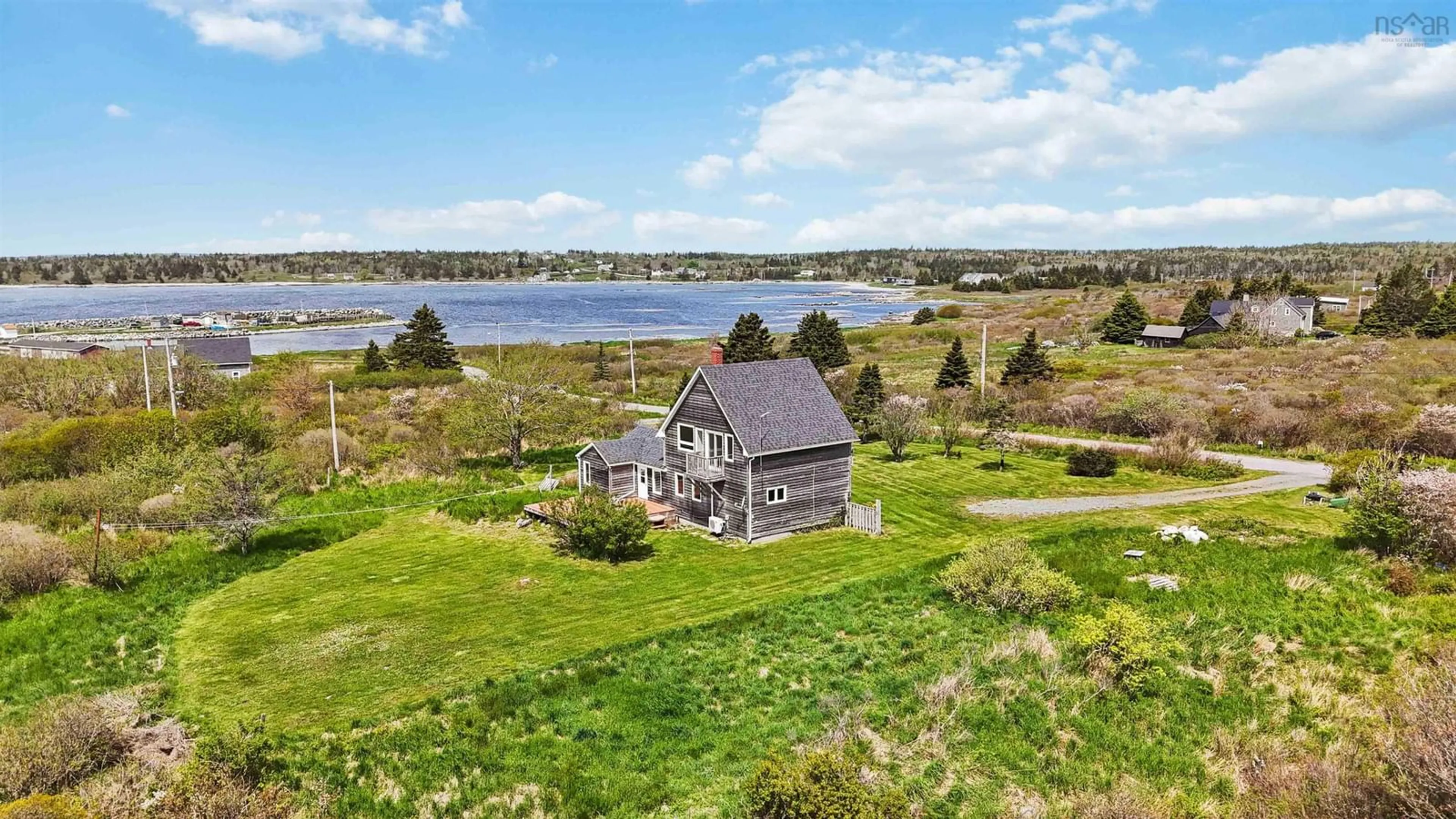 A pic from outside/outdoor area/front of a property/back of a property/a pic from drone, water/lake/river/ocean view for 21 West Berlin Wharf Rd, West Berlin Nova Scotia B0J 2H0