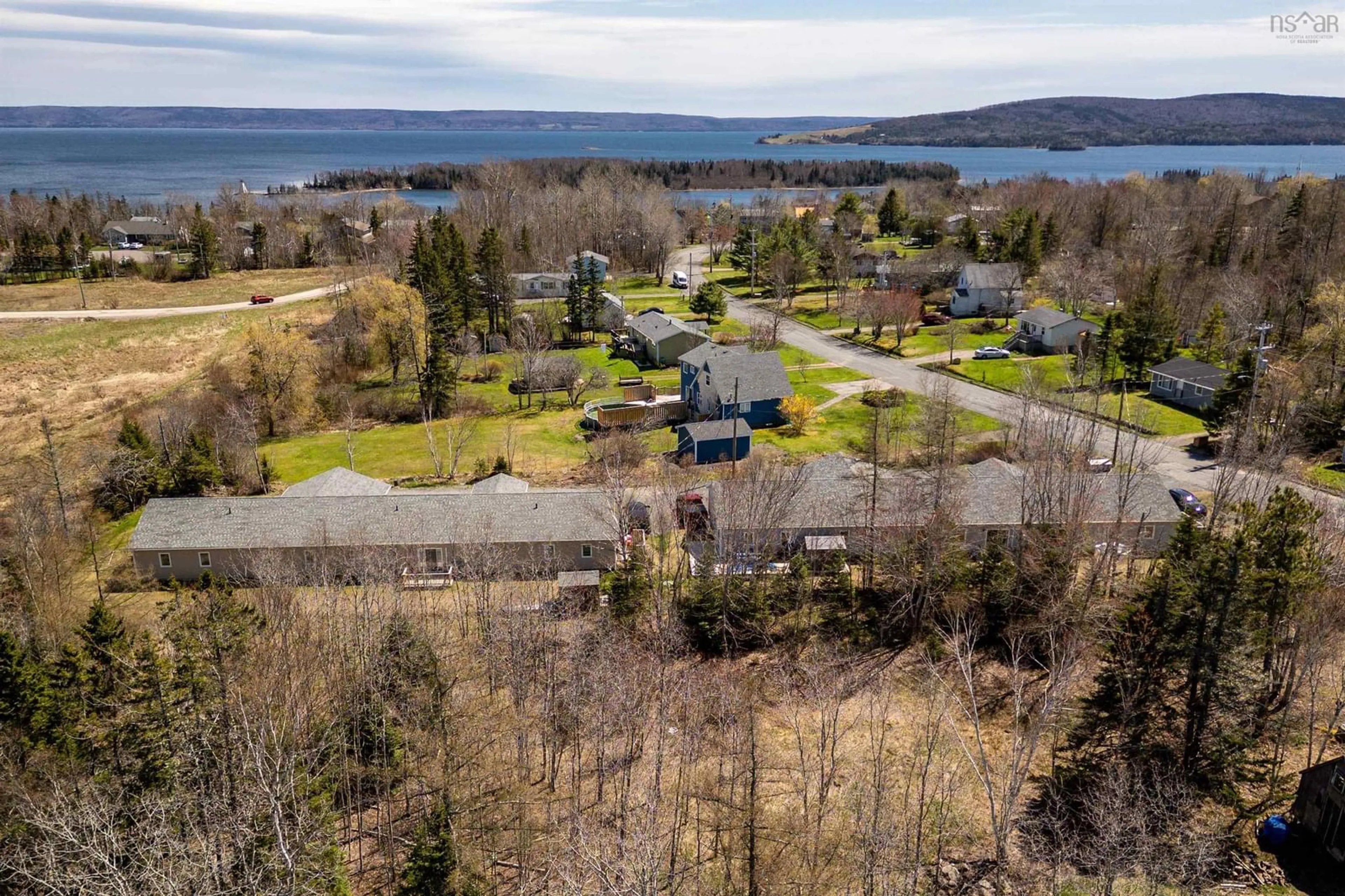 A pic from outside/outdoor area/front of a property/back of a property/a pic from drone, water/lake/river/ocean view for 1-6 Daisy Lane    Baddeck, Baddeck Nova Scotia B0E 1B0