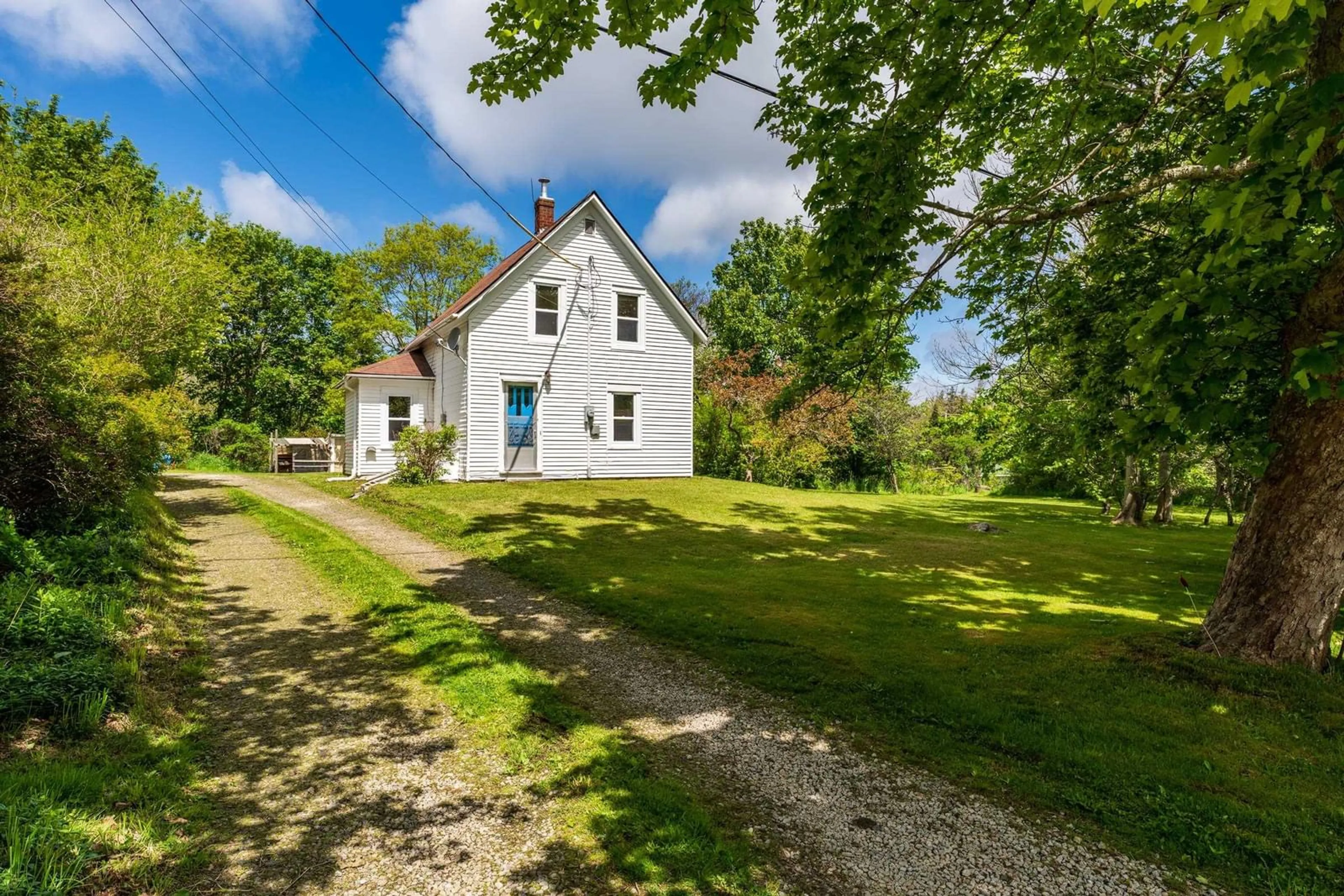 A pic from outside/outdoor area/front of a property/back of a property/a pic from drone, street for 9330 Highway 3, Pleasant Lake Nova Scotia B5A 5J9