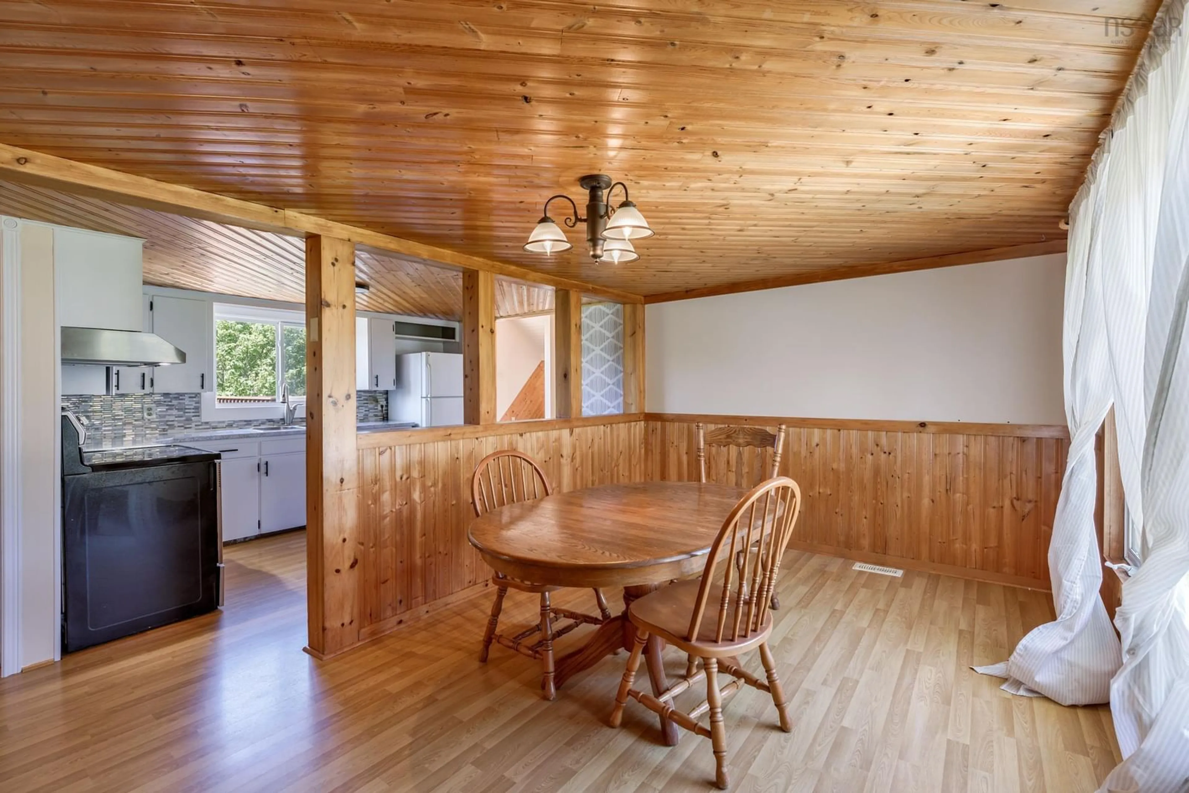 Dining room, wood/laminate floor for 211 Ellis Rd, Sand Beach Nova Scotia B5A 5G5