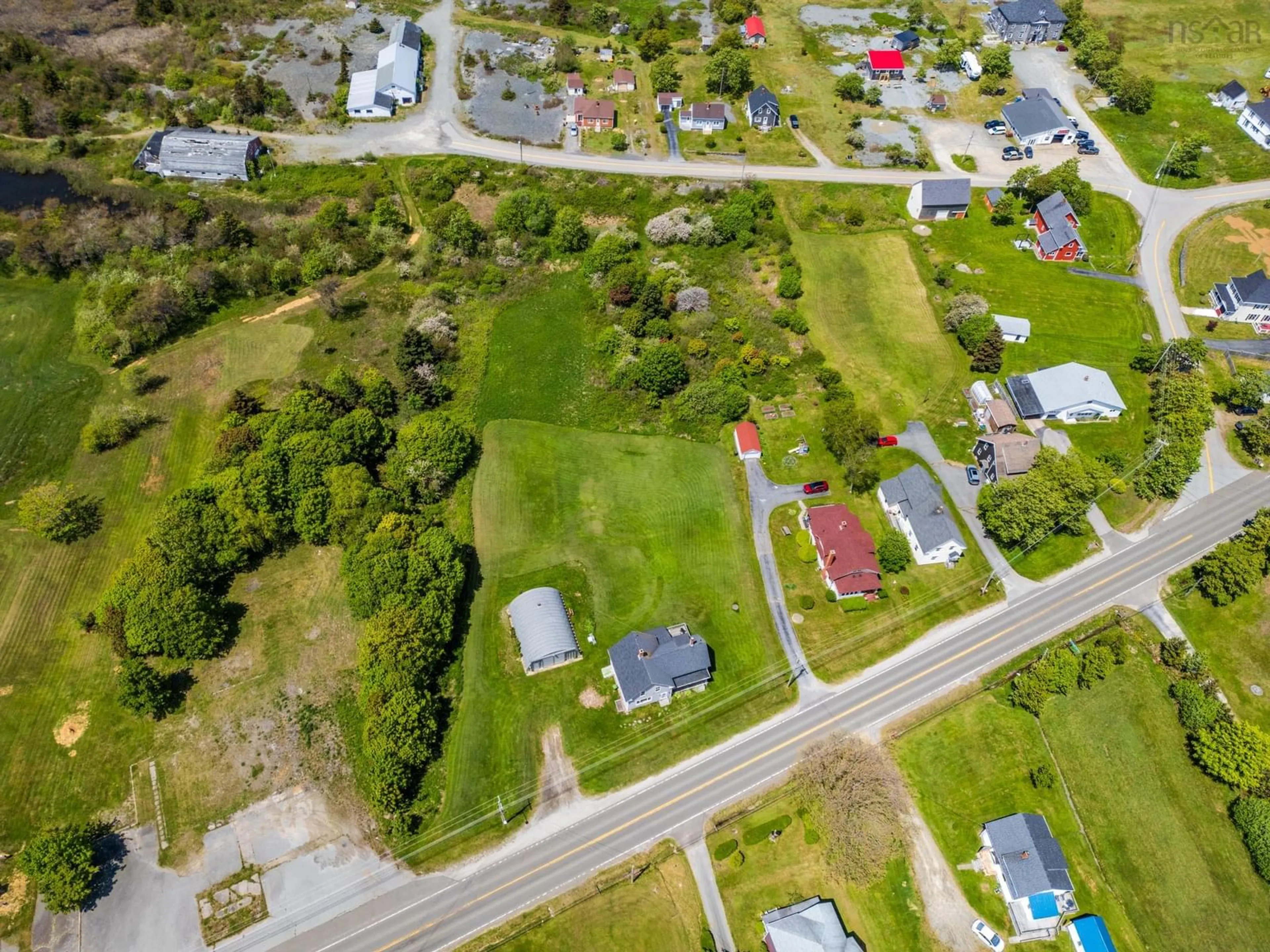 A pic from outside/outdoor area/front of a property/back of a property/a pic from drone, street for Highway 1 #3163, Belliveaus Cove Nova Scotia B0W 1M0