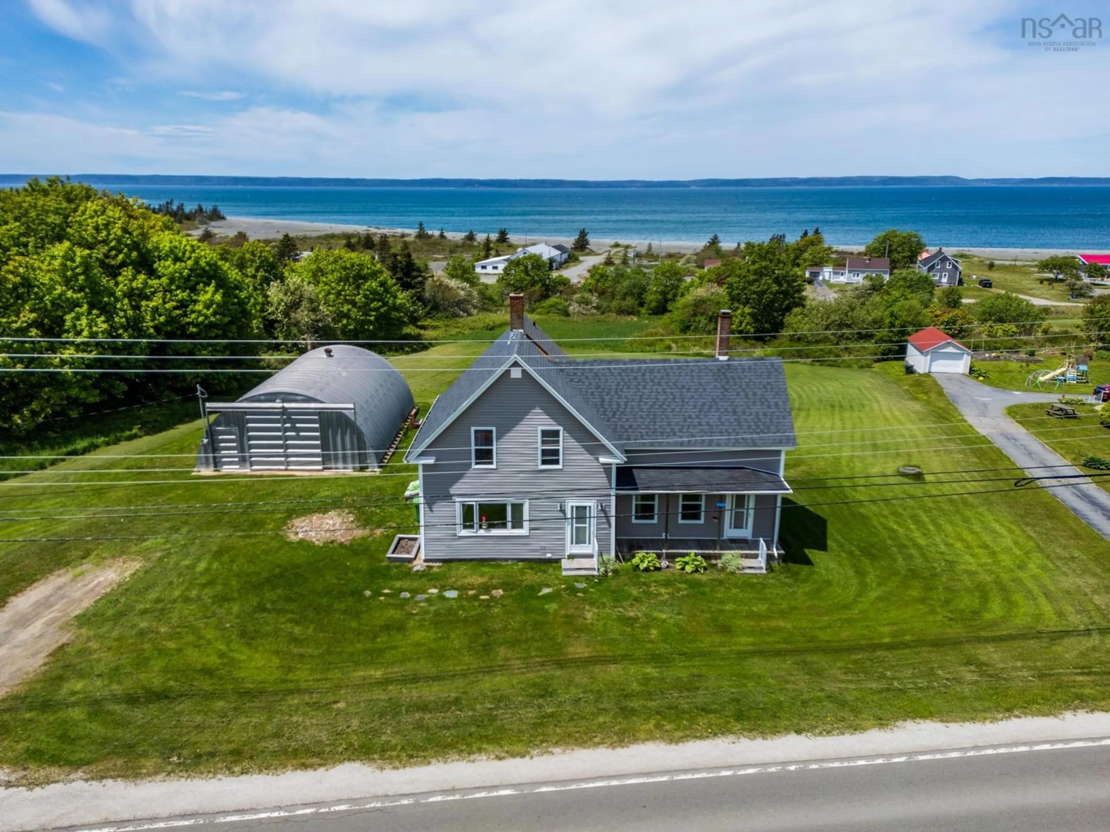 A pic from outside/outdoor area/front of a property/back of a property/a pic from drone, water/lake/river/ocean view for Highway 1 #3163, Belliveaus Cove Nova Scotia B0W 1M0