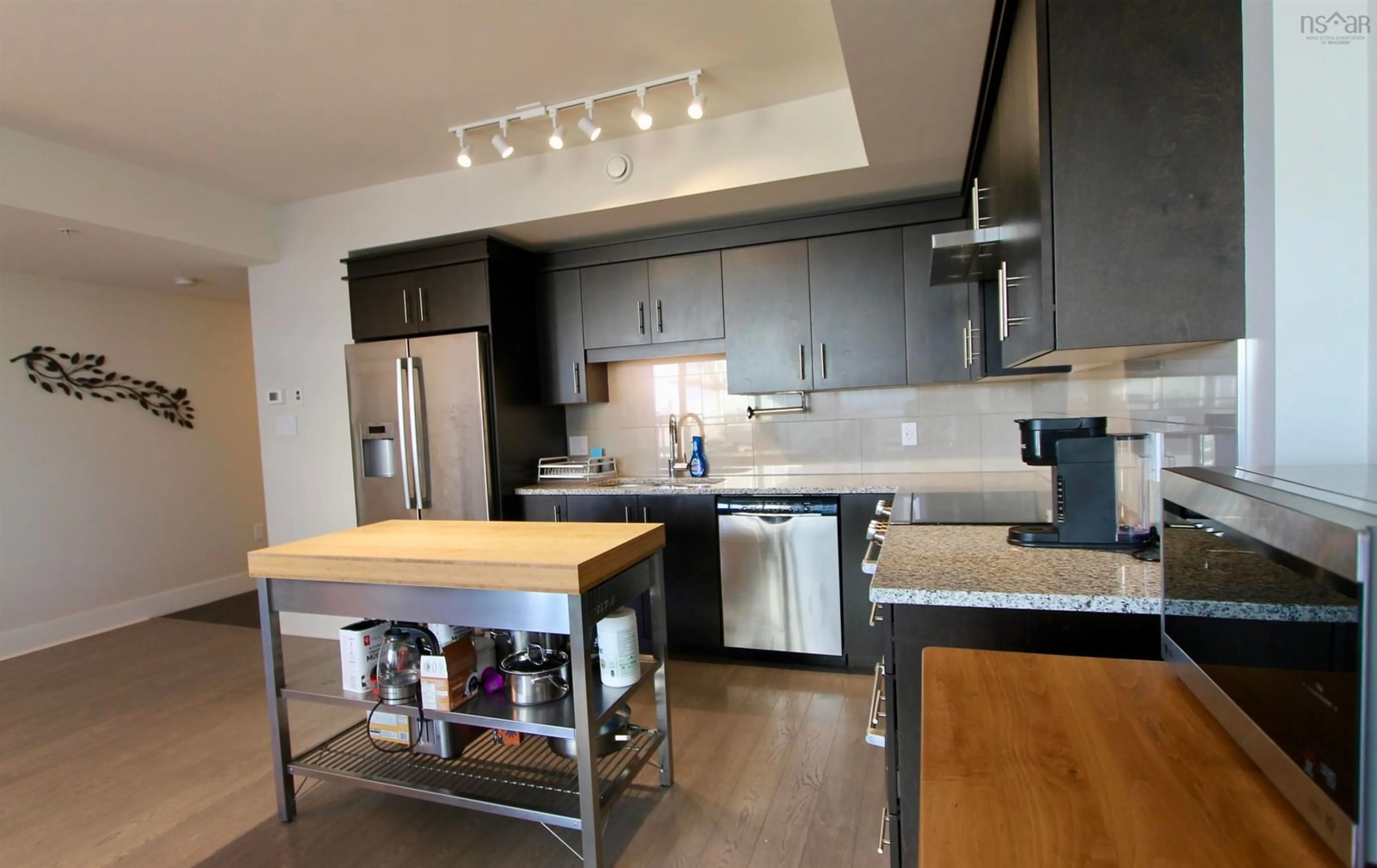 Open concept kitchen, wood/laminate floor for 15 Kings Wharf Pl #404, Dartmouth Nova Scotia B2Y 0C2